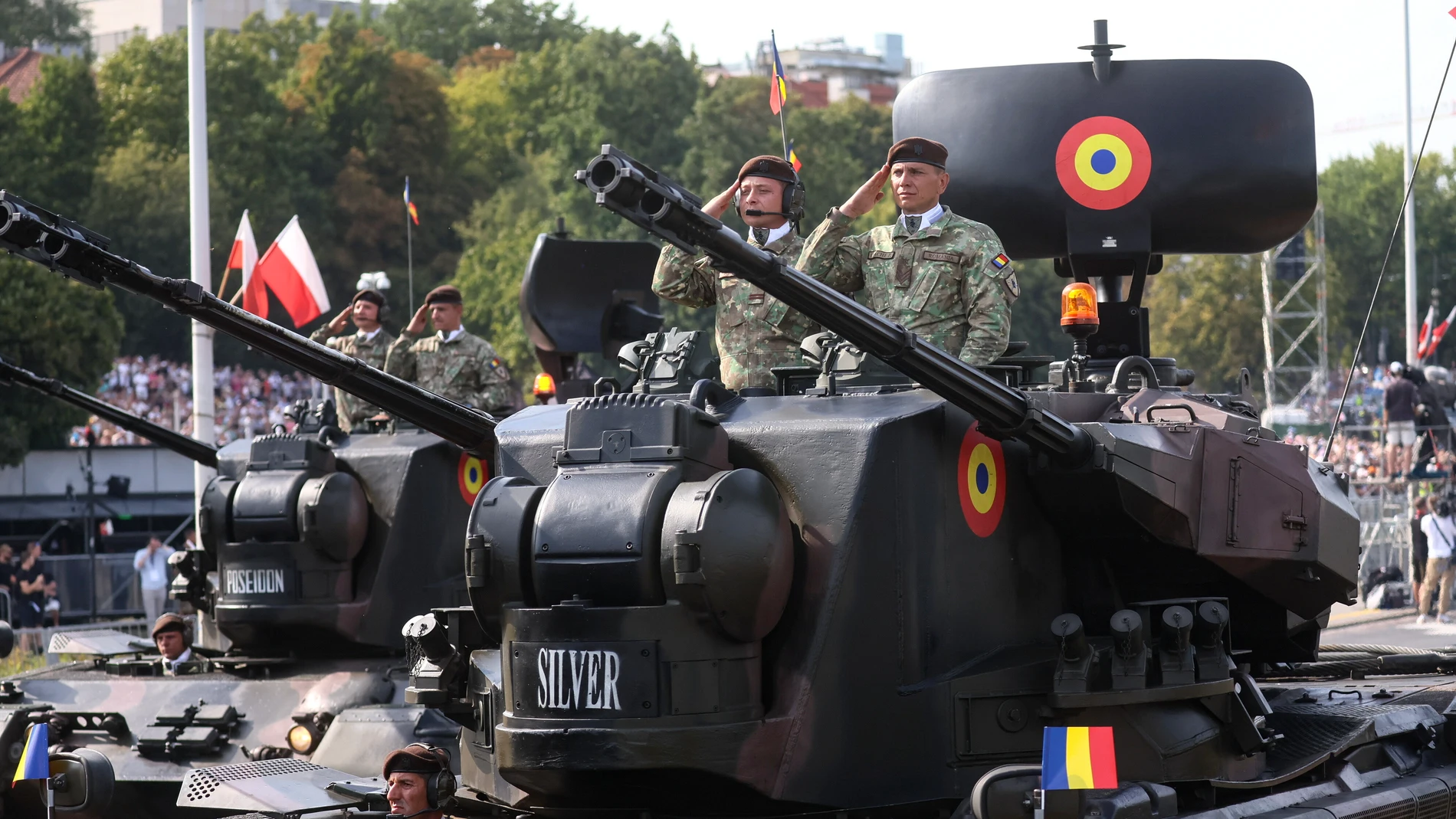 Warsaw (Poland), 15/08/2024.- Romanian soldiers ride on armored military vehicles as they take part in a military parade marking the Polish Armed Forces Day in Warsaw, Poland, 15 August 2024. Polish Armed Forces Day is a national holiday celebrated annually on 15 August in Poland, commemorating the anniversary of the 1920 victory over Soviet Russia at the Battle of Warsaw during the Polish-Soviet War. (Polonia, Rumanía, Rusia, Varsovia) EFE/EPA/LESZEK SZYMANSKI POLAND OUT