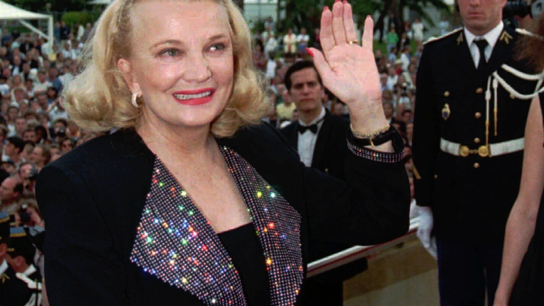 FILE - U.S. actress Gena Rowlands waves to the crowd as she arrives at the Festival Palace in Cannes Tuesday May 23, 1995, to attend the screening of Terence Davies' "The Neon Bible" for the 48th International Film Festival. Rowlands, hailed as one of the greatest actors to ever practice the craft and a guiding light in independent cinema as a star in groundbreaking movies by her director husband, John Cassavetes, and later charmed audiences in her son's tear-jerker “The Notebook,” has died a...