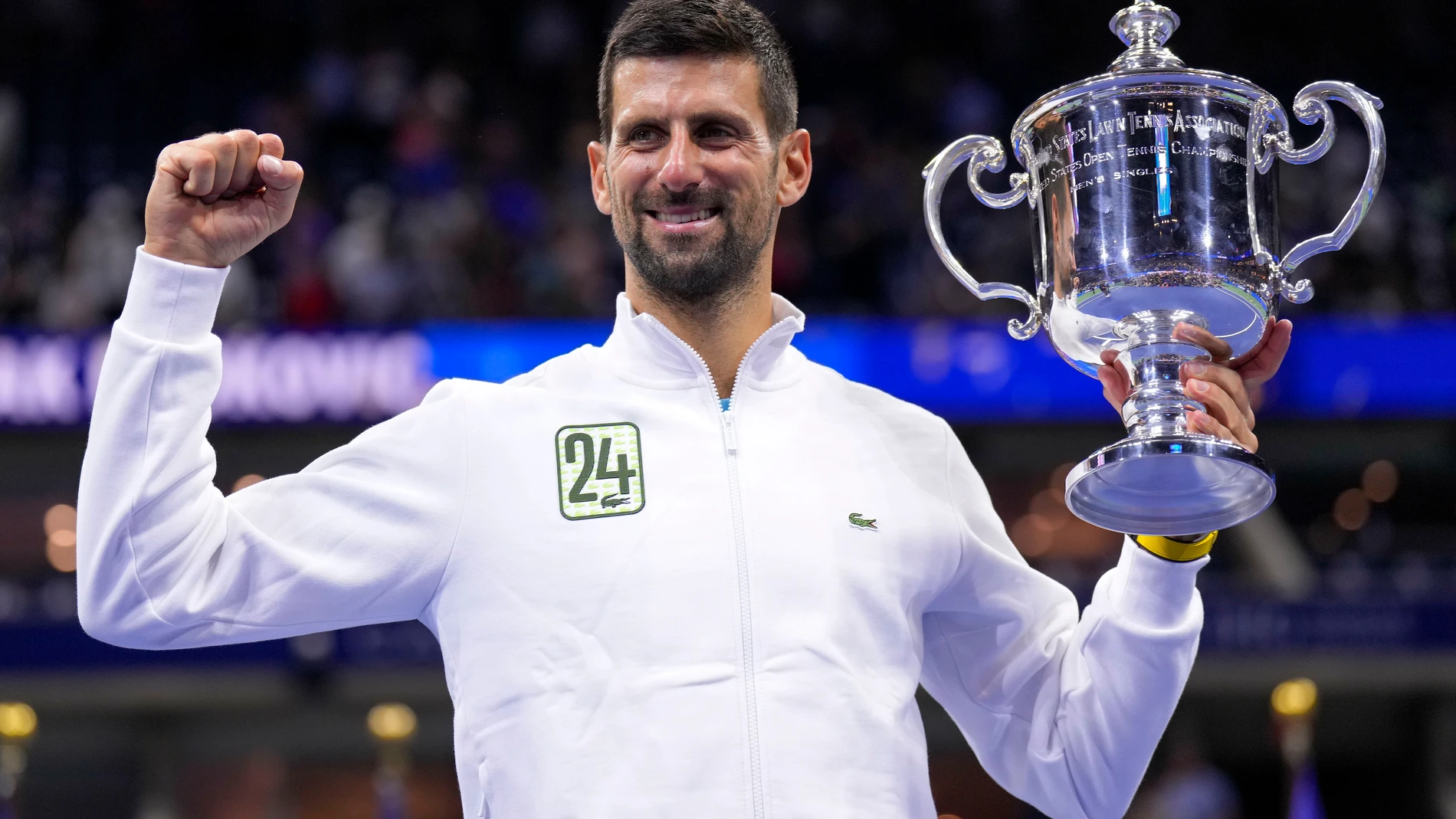 FILE - Novak Djokovic, of Serbia, holds up the championship trophy after defeating Daniil Medvedev, of Russia, in the men's singles final of the U.S. Open tennis championships, Sunday, Sept. 10, 2023, in New York. (AP Photo/Manu Fernandez, File)