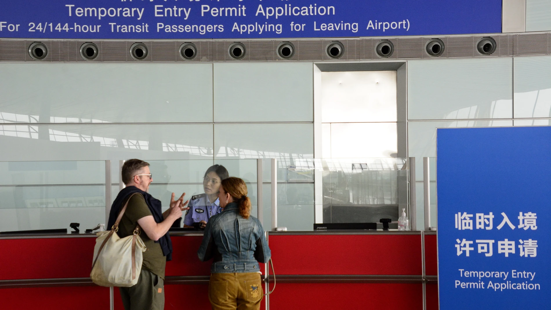 BEIJING, July 10, 2024 -- Foreign passengers apply for visa-free entry permits at the border check section of Beijing Capital International Airport in Beijing, capital of China, July 10, 2024. Currently, foreign nationals from 54 countries are eligible for the 72/144-hour transit visa-free policies that are effective at 38 ports in 18 provincial-level regions across China. China recorded 14.64 million inbound trips made by foreigners in the first half of this year, up 152.7 percent year ...
