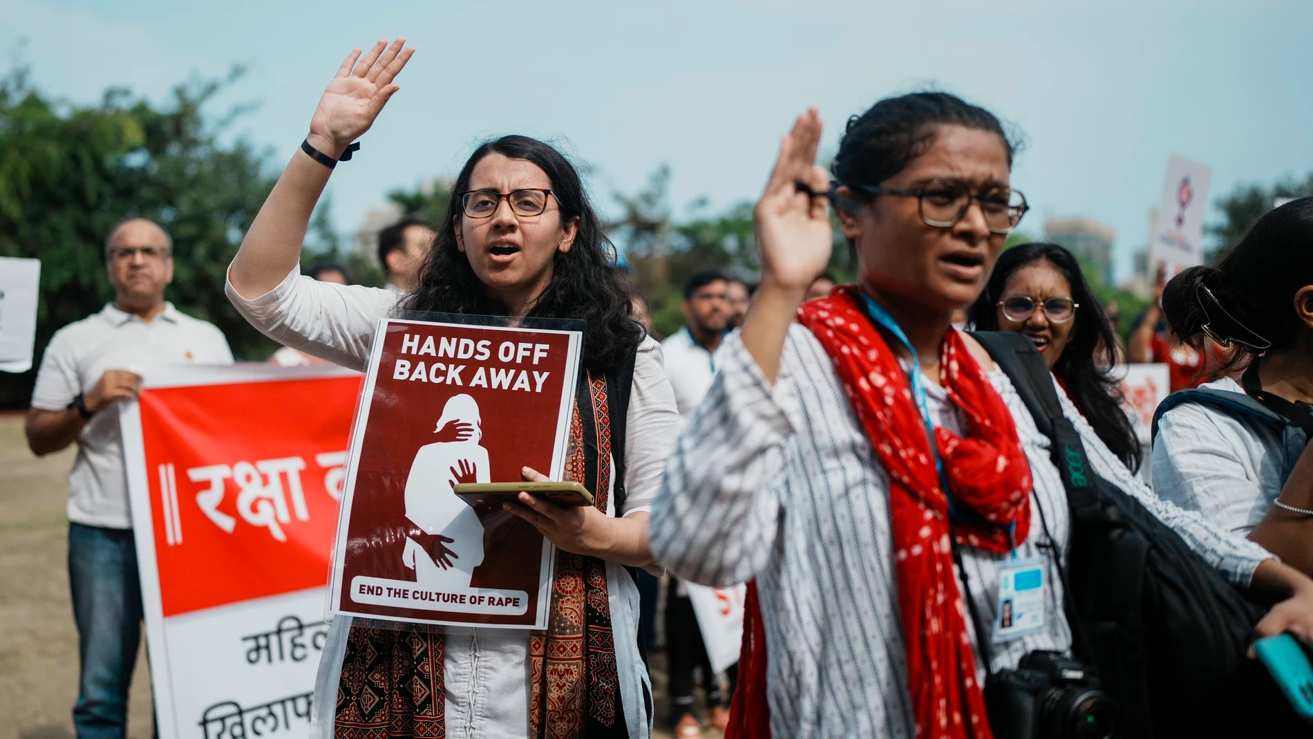 Indians protesting against the rape and killing of a trainee doctor at a government hospital in Kolkata, hold placards in Mumbai, India, Monday, Aug. 19, 2024. (AP Photo/Rafiq Maqbool)