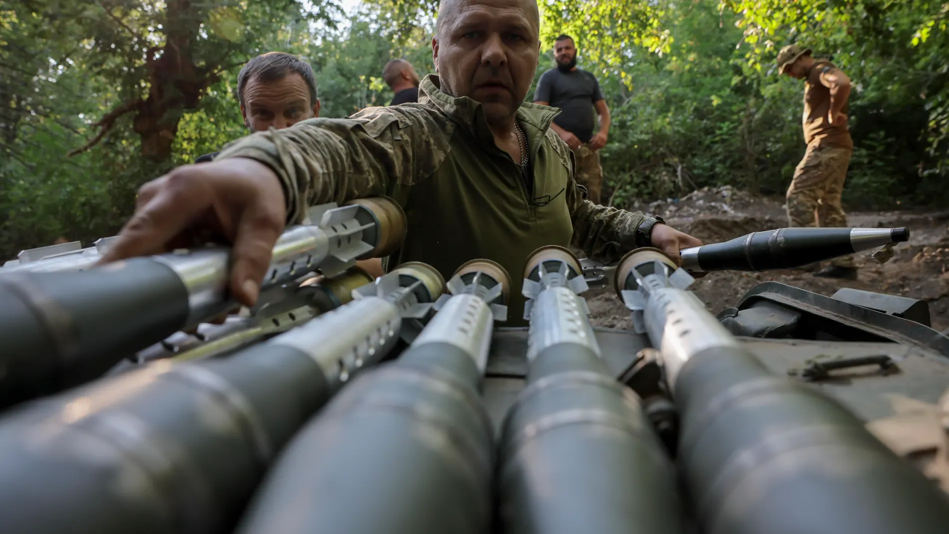 Donetsk (Ukraine), 17/08/2024.- A handout picture made available on 19 August 2024 by the press service of the 24th Mechanized Brigade of Ukrainian Armed Forces shows servicemen of 24th Mechanized Brigade, named after King Danylo, loading ammunition to BRM1K infantry fighting vehicle near the city of Chasiv Yar in Donetsk region, Ukraine, 17 August 2024. Russian troops entered Ukrainian territory on 24 February 2022, starting a conflict that has provoked destruction and a humanitarian crisis....