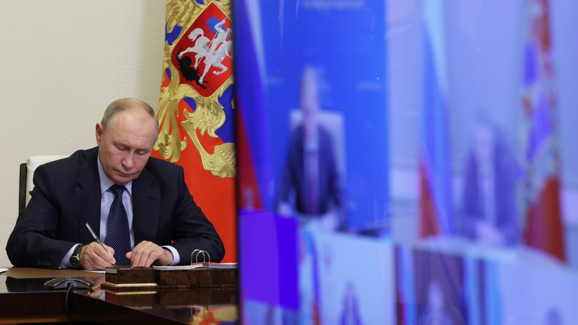Russian President Vladimir Putin holds a meeting about the situation in border areas of Belgorod, Kursk and Bryansk regions of Russia, at Novo-Ogaryovo state residence outside of Moscow, Russia, Thursday, Aug. 22, 2024. (Gavriil Grigorov, Sputnik, Kremlin Pool Photo via AP)