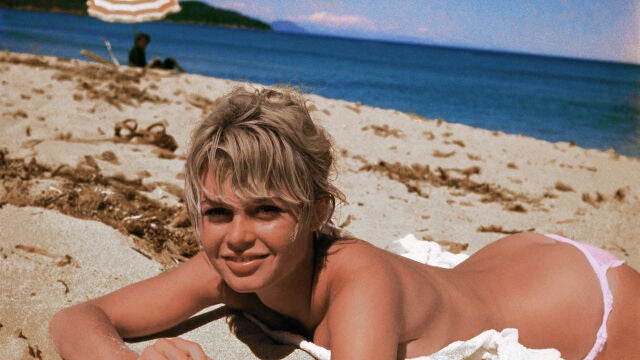 Brigitte Bardot, originally Camille Javal, actress, pictured here on a towel, sunning on the beach in 1960. 