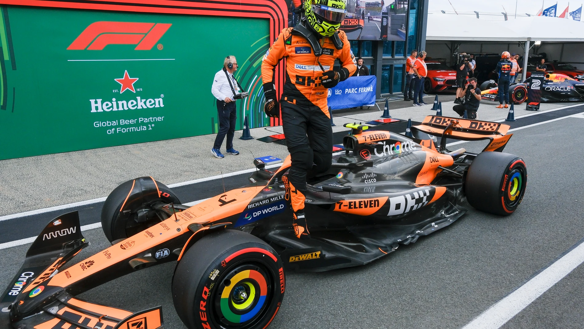 McLaren driver Lando Norris of Britain celebrates his pole position after qualifying session ahead of the Formula One Dutch Grand Prix race at the Zandvoort racetrack, Netherlands, Saturday, Aug. 24, 2024. (AP Photo/Patrick Post, Pool)