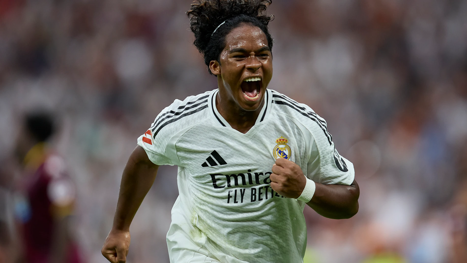 25 August 2024, Spain, Madrid: Real Madrid's Endrick celebrates scoring his side's third goal during the Spanish Primera Division La Liga soccer match between Real Madrid CF and Real Valladolid at Santiago Bernabeu Stadium. Photo: Ruben Albarran/ZUMA Press Wire/dpa Ruben Albarran/ZUMA Press Wire/d / DPA 25/08/2024 ONLY FOR USE IN SPAIN