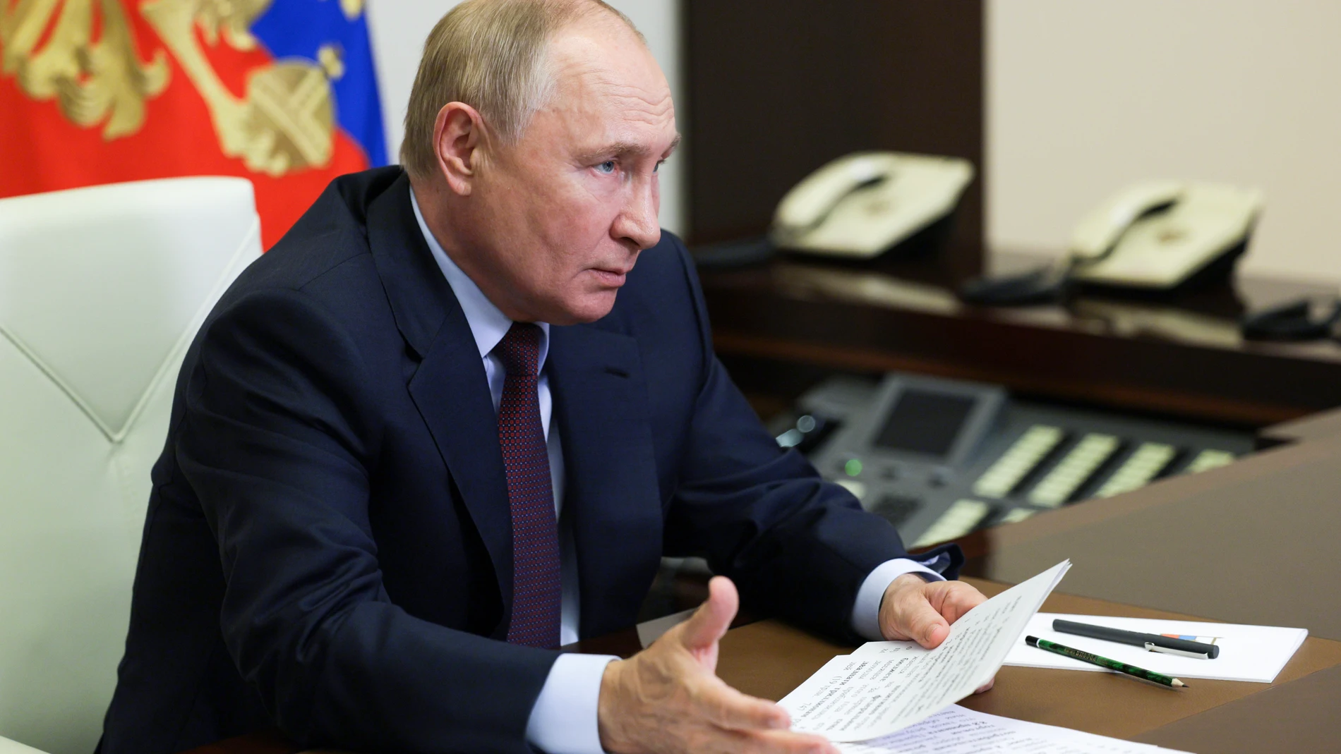 Russian President Vladimir Putin speaks at a meeting on economic issues via videoconference at Novo-Ogaryovo state residence outside of Moscow, Russia, Monday, Aug. 26, 2024. (Alexander Kazakov, Sputnik, Kremlin Pool Photo via AP)