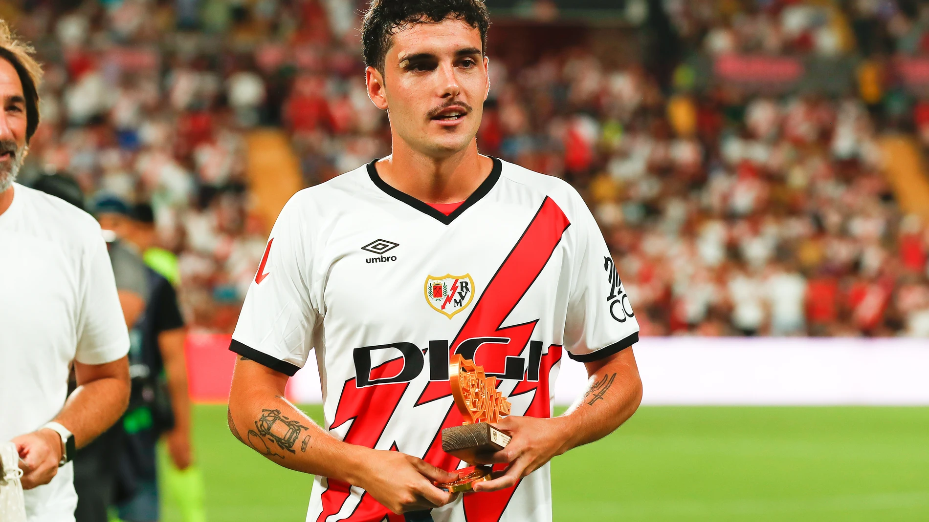 Sergio Camello of Rayo Vallecano is honored for winning the Gold medal at the Olympic Games during the Spanish league, La Liga EA Sports, football match played between Rayo Vallecano and FC Barcelona at Vallecas stadium on August 27, 2024, in Madrid, Spain. AFP7 27/08/2024 ONLY FOR USE IN SPAIN
