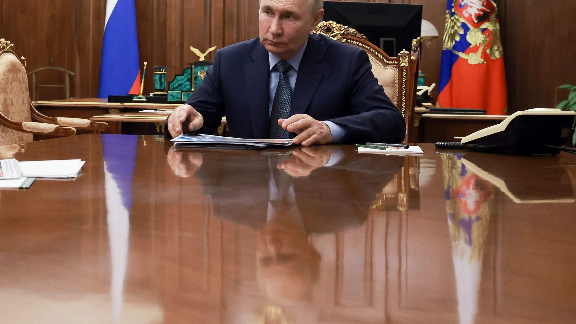 Russian President Vladimir Putin speaks with Promsvyazbank Chairman and CEO Pyotr Fradkov at the Kremlin in Moscow, Russia, Thursday, Aug. 29, 2024. (Alexander Kazakov, Sputnik, Kremlin, Pool Photo via AP)