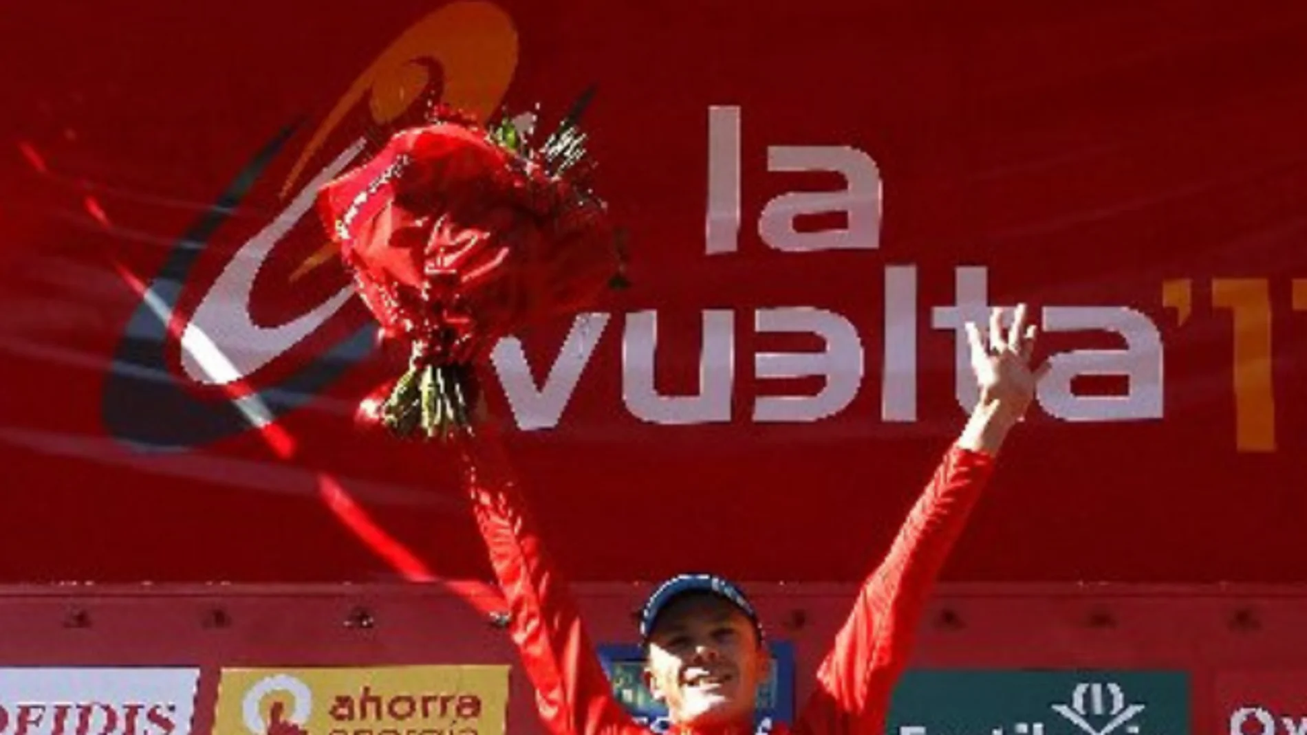Chris Froome, vestido de rojo en el podio de Salamanca en 2011
