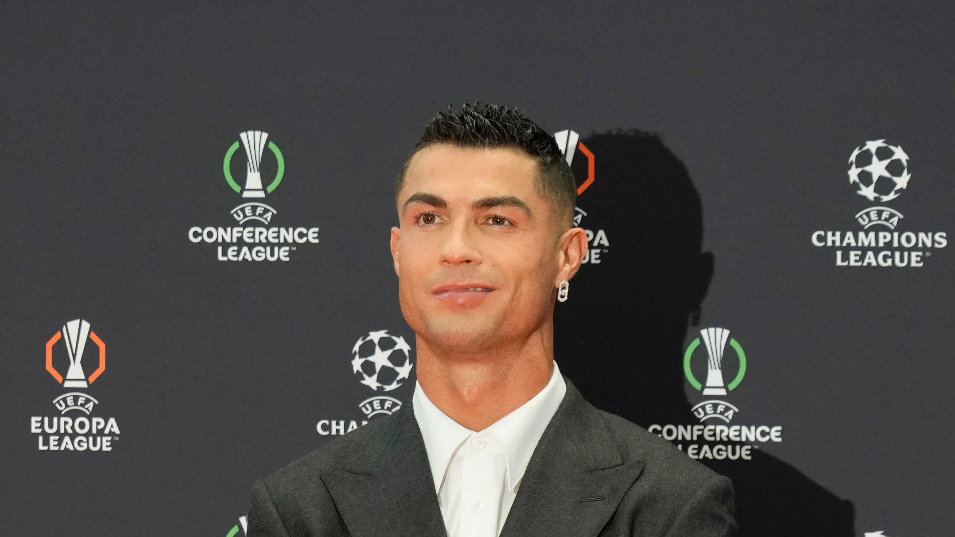 Cristiano Ronaldo, the all-time leading goalscorer in the Champions League, poses as he arrives for the Champions League, league phase, draw, in Monaco, Thursday, Aug. 29, 2024. (AP Photo/Gregorio Borgia)
