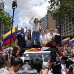 Maria Corina Machado leads a protest against the reelection of President Nicol&aacute;s Maduro one month after the disputed presidential vote which she claims the opposition won by a landslide, in Caracas, Venezuela, Wednesday, Aug. 28, 2024. 