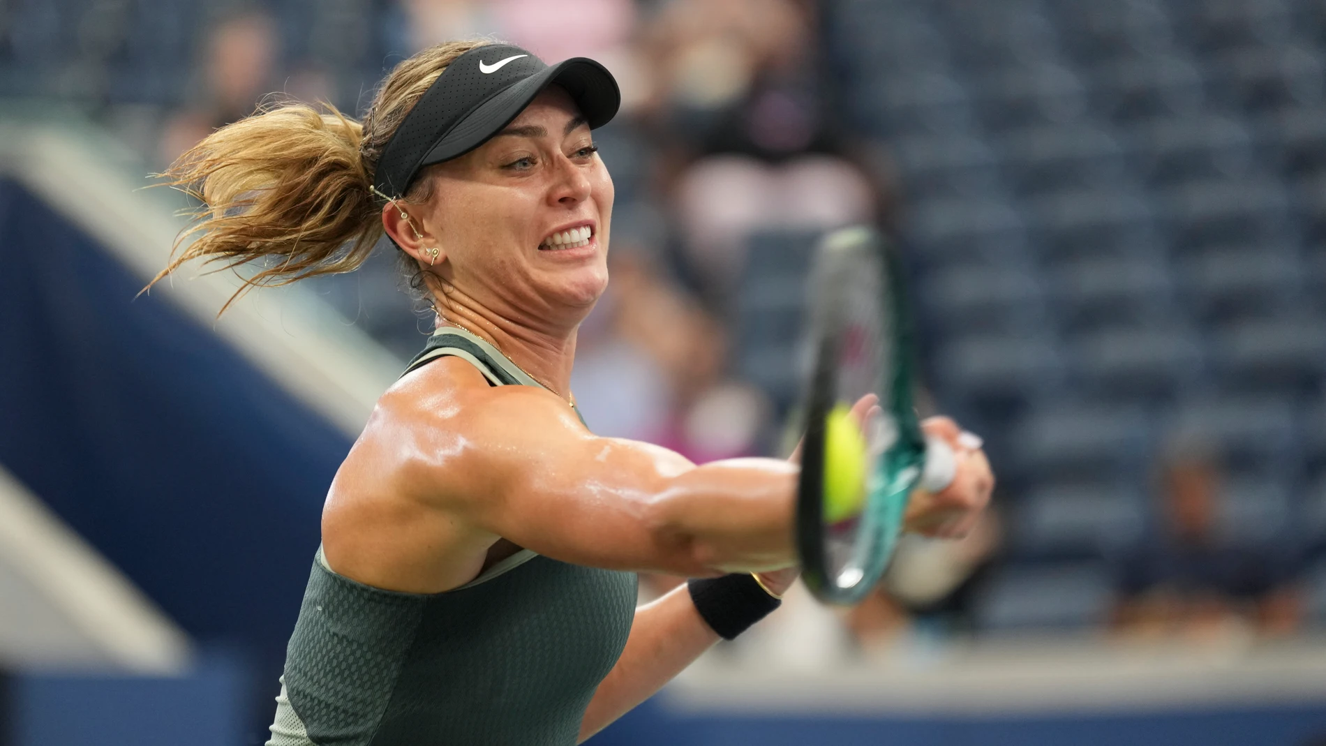 Paula Badosa, of Spain, returns a shot to Yafan Wang, of China, during the fourth round of the U.S. Open tennis championships, Sunday, Sept. 1, in New York. 2024. (AP Photo/Eduardo Munoz Alvarez)