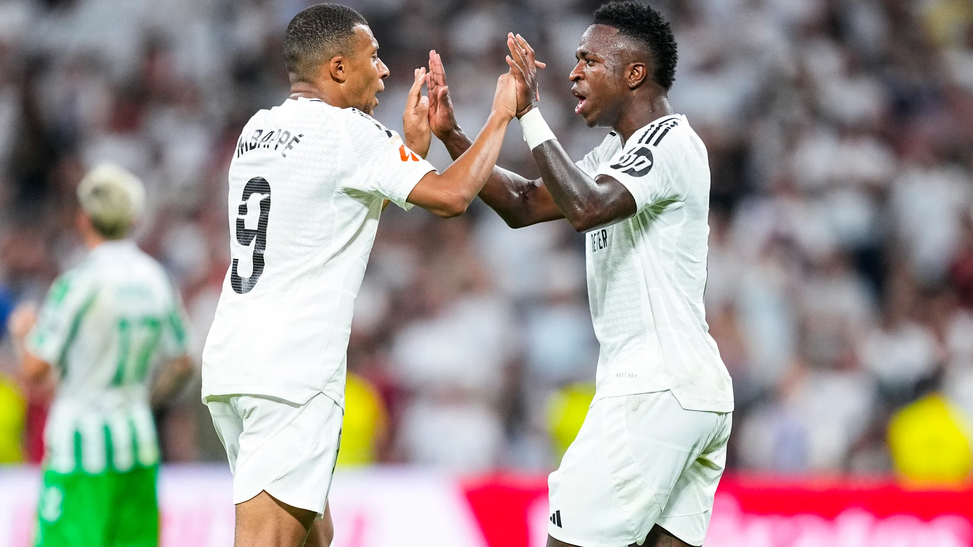 Kylian Mbappe of Real Madrid and Vinicius Junior of Real Madrid gestures during the Spanish League, LaLiga EA Sports, football match played between Real Madrid and Real Betis Balompie at Santiago Bernabeu stadium on September 01, 2024, in Madrid, Spain.AFP7 01/09/2024 ONLY FOR USE IN SPAIN