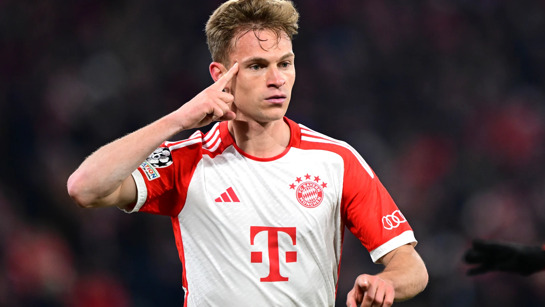 FILE - Bayern's Joshua Kimmich celebrates after scoring the opening goal during the Champions League quarter final second leg soccer match against Arsenal, in Munich, Germany, on April 17, 2024. Bayern Munich midfielder Joshua Kimmich has been appointed captain of Germany's national team after his predecessor Ilkay Gündogan was among a string of senior players to retire from international duty after Euro 2024. (AP Photo/Christian Bruna, File)