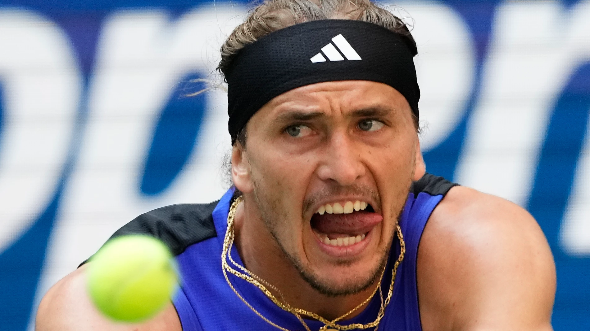 Alexander Zverev, of Germany, returns a shot to Taylor Fritz, of the United States, during the quarterfinals of the U.S. Open tennis championships, Tuesday, Sept. 3, 2024, in New York. (AP Photo/Kirsty Wigglesworth)