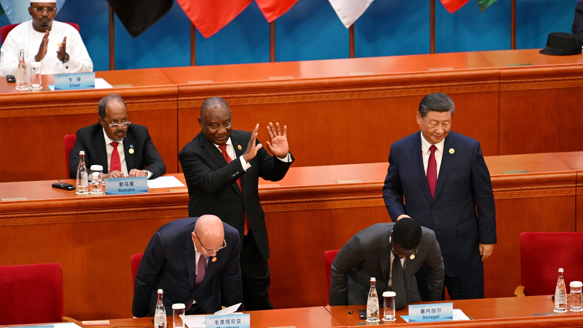 South Africa's President Cyril Ramaphosa, center, gestures to China's President Xi Jinping after Ramaphosa's speech at the opening ceremony of the Forum on China-Africa Cooperation (FOCAC) at the Great Hall of the People in Beijing, Thursday, Sept. 5, 2024. (Greg Baker/Pool Photo via AP)