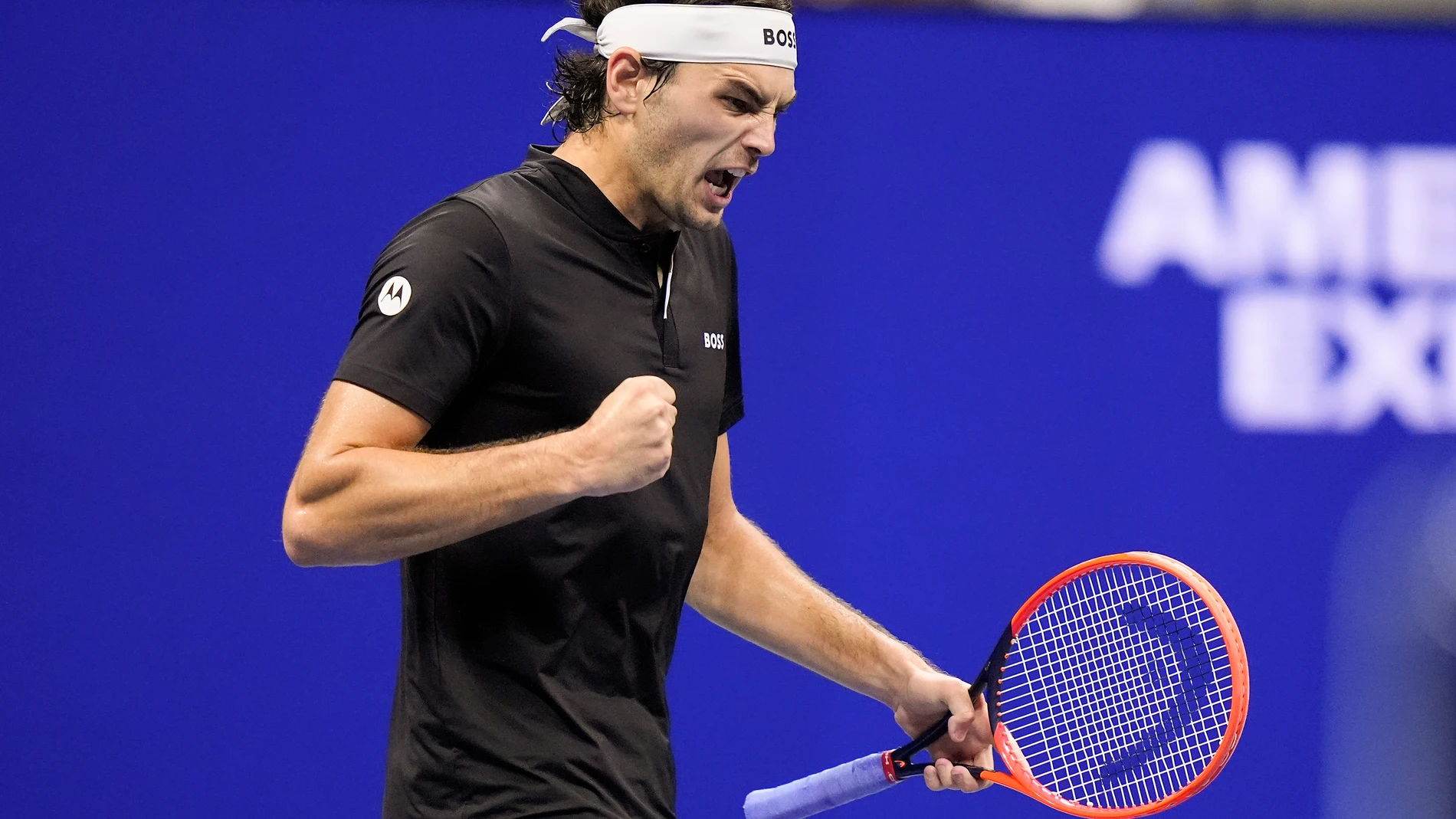 Taylor Fritz, of the United States, reacts after winning the fourth set against Frances Tiafoe, of the United States, during the men's singles semifinal of the U.S. Open tennis championships, Friday, Sept. 6, 2024, in New York. (AP Photo/Frank Franklin II)