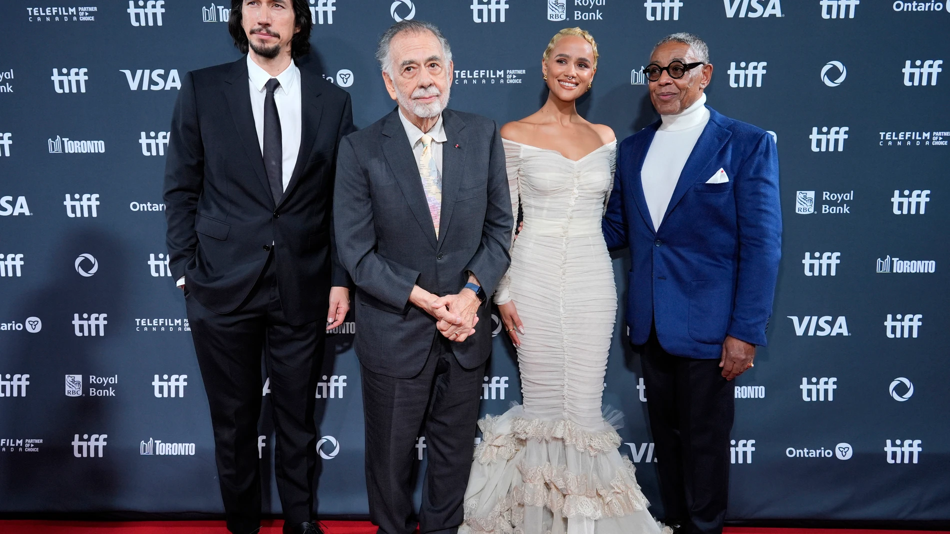 Francis Ford Coppola, second from left, the writer/director of "Megalopolis," poses with cast members, from left, Adam Driver, Nathalie Emmanuel and Giancarlo Esposito at the North American premiere of the film at Roy Thomson Hall during the Toronto International Film Festival, Monday, Sept. 9, 2024, in Toronto. (AP Photo/Chris Pizzello)