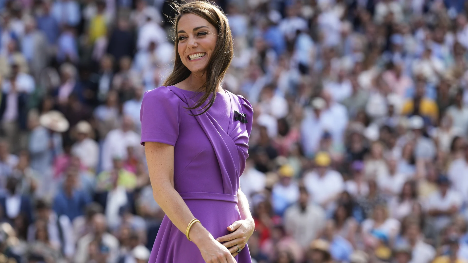 Kate, Princess of Wales, smiles as she waits to present the trophy to Carlos Alcaraz of Spain at the men's singles final at the Wimbledon tennis championships in London