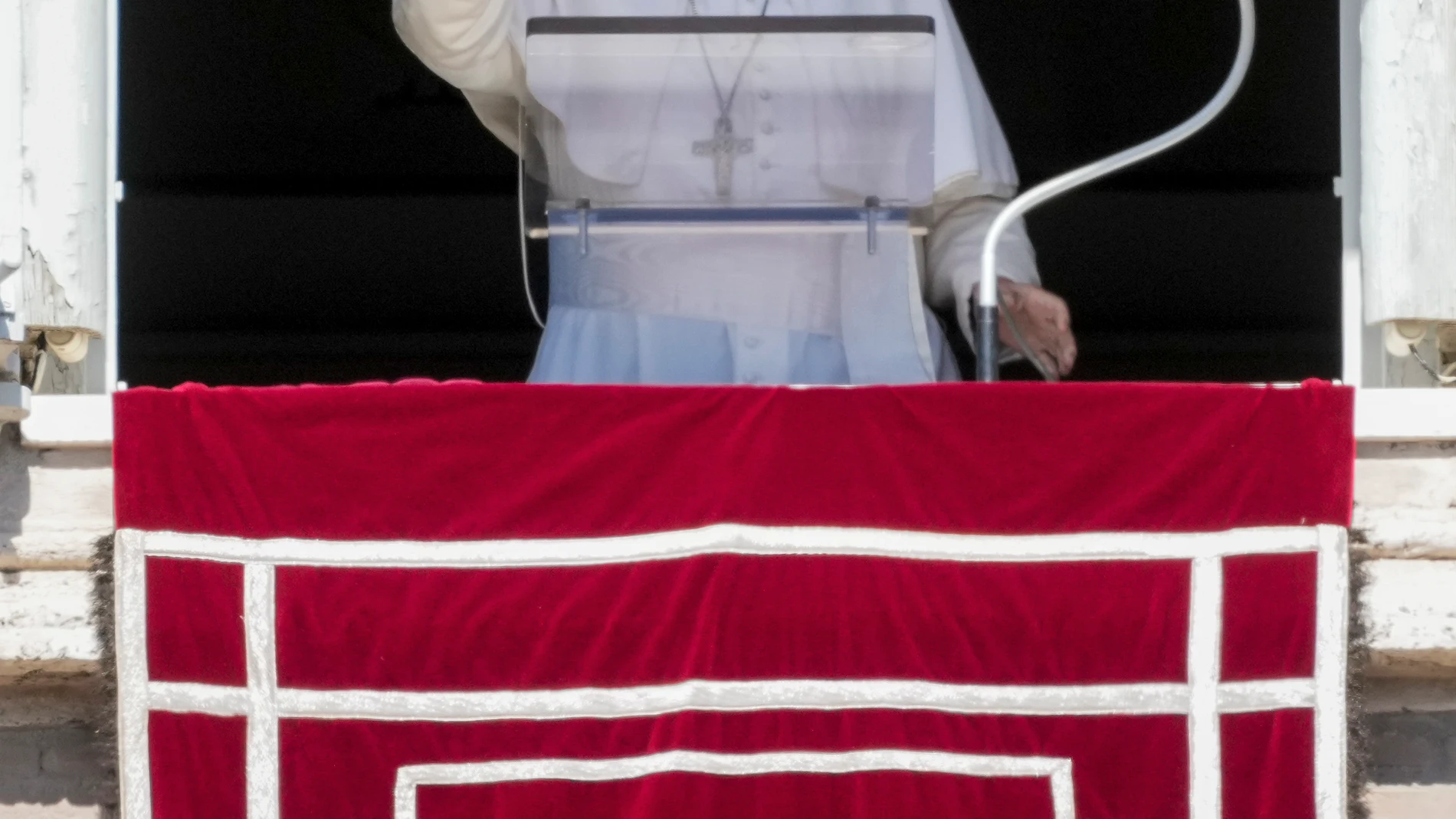 Pope Francis delivers his blessing as he recites the Angelus noon prayer from the window of his studio overlooking St.Peter's Square, at the Vatican, Sunday, Sept. 15, 2024. (AP Photo/Andrew Medichini)