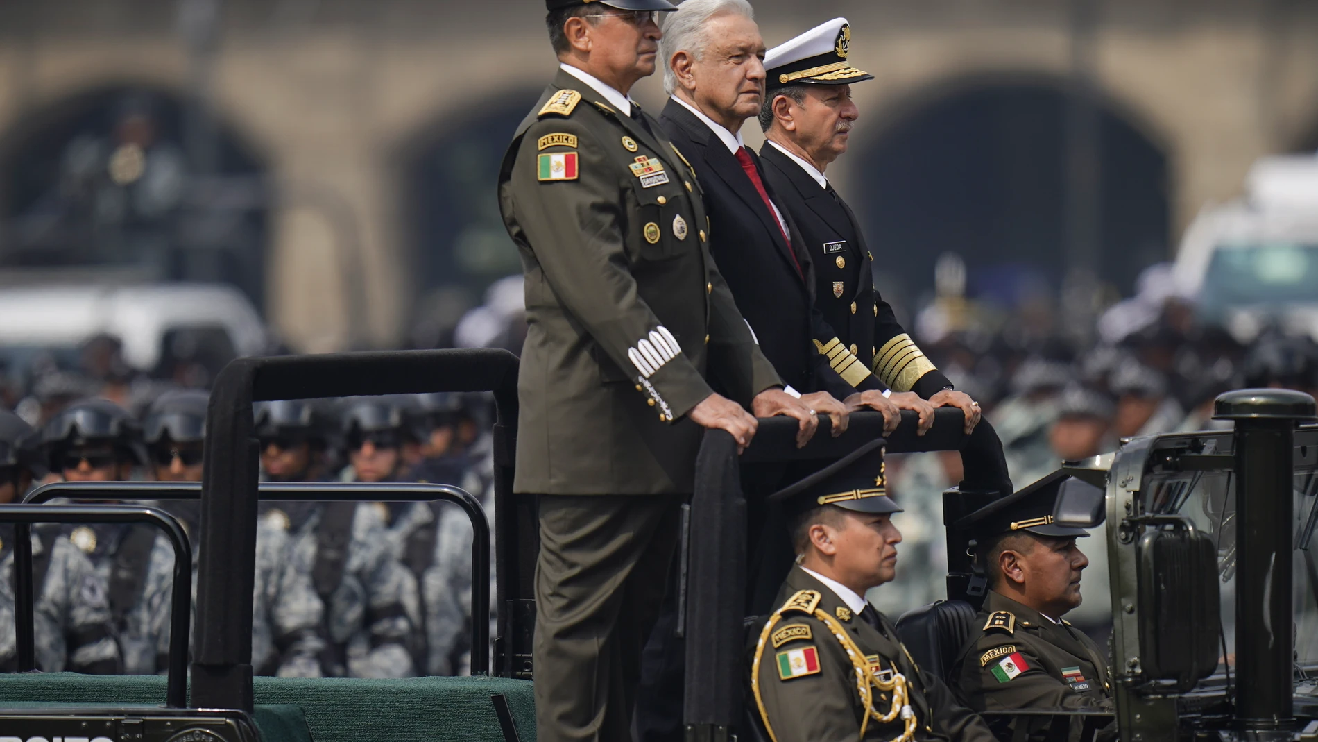 Mexican President Andrés Manuel López Obrador, center, rides with Defense Secretary Luis Cresencio Sandoval, left, and Navy Secretary Rafael Ojeda Durán to review the troops before the start of the annual Independence Day parade in the main square, the Zocalo, in Mexico City, Monday, Sept. 16, 2024. (AP Photo/Felix Marquez)