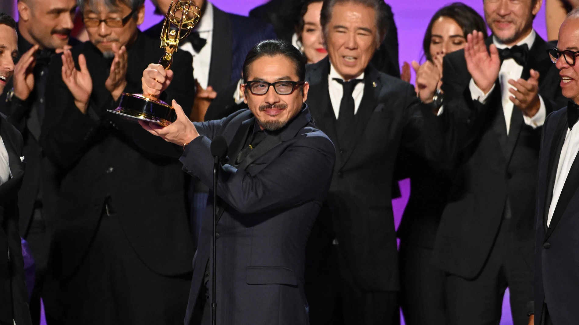 IMAGE DISTRIBUTED FOR THE TELEVISION ACADEMY – Hiroyuki Sanada, center, and the team from "Shogun" accept the award for outstanding drama series at the 76th Emmy Awards on Sunday, Sept. 15, 2024 at the Peacock Theater in Los Angeles. (Photo by Phil McCarten/Invision for the Television Academy/AP Content Services)