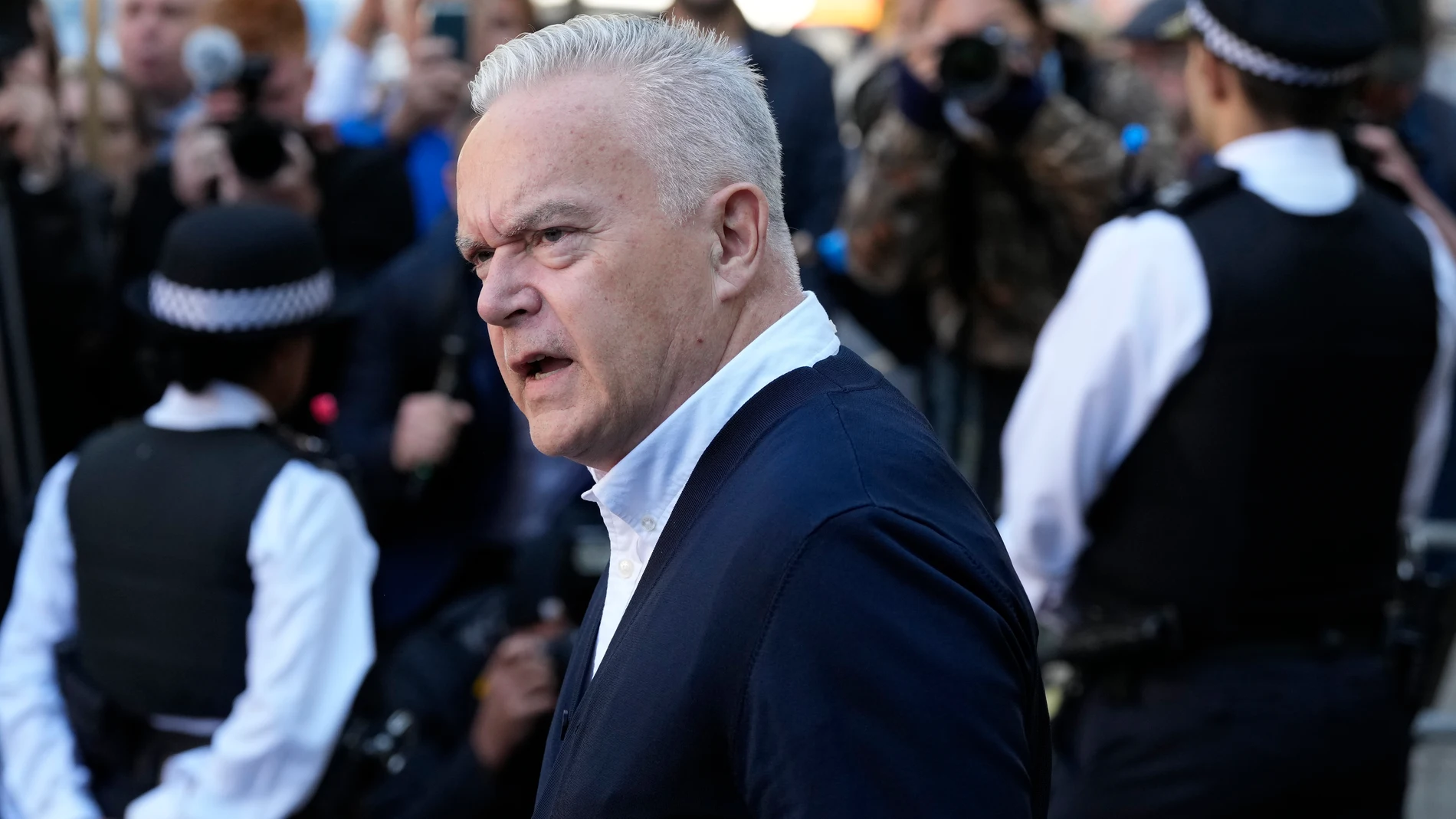 Huw Edwards an ex-BBC news presenter leaves Westminster Magistrate's Court following his conviction for three counts of making indecent images of children, he was given a six month prison sentence, suspended for two years and placed on the sex offenders register, after he pleaded guilty in London, Monday, Sept. 16, 2024. (AP Photo/Frank Augstein)