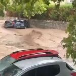 Decenas de coches inundados y arrastrados tras el desbordamiento de la cañada en Alcalá del Júcar (Albacete)