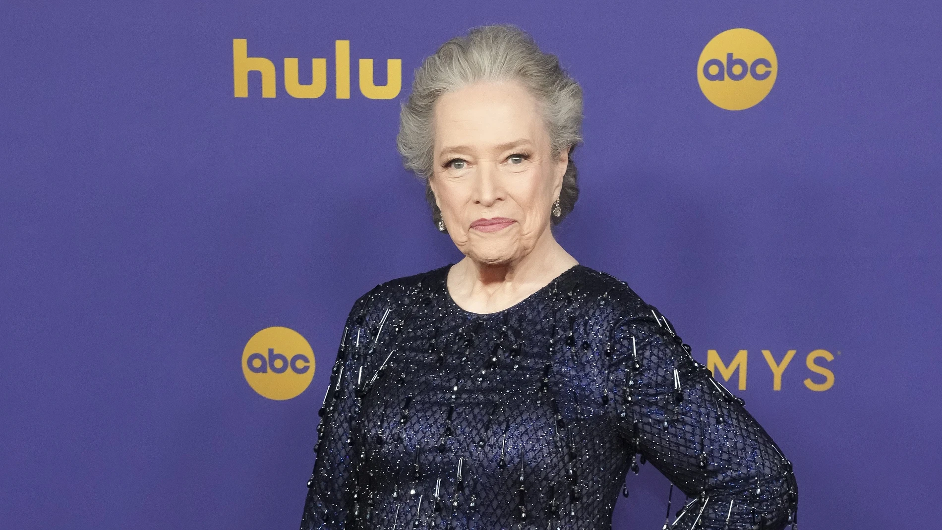Kathy Bates arrives on the red carpet for the 76th annual Emmy Awards ceremony held at the Peacock Theater in Los Angeles