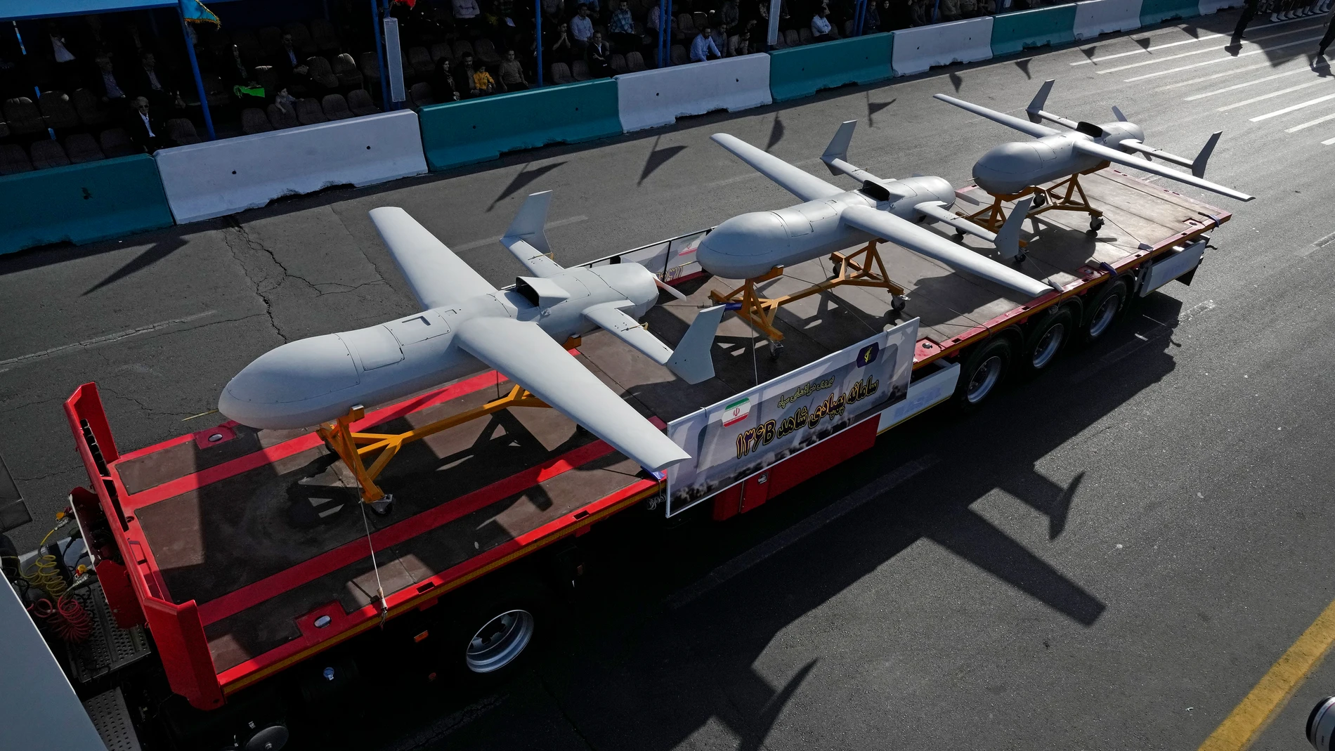 "Shahed-136 B" drones are displayed by Iranian Revolutionary Guard during an annual armed forces parade marking anniversary of the beginning of war against Iran by former Iraqi Dictator Saddam Hussein 44 years ago, in front of the shrine of the late revolutionary founder Ayatollah Khomeini, just outside Tehran, Iran, Saturday, Sept. 21, 2024. (AP Photo/Vahid Salemi)