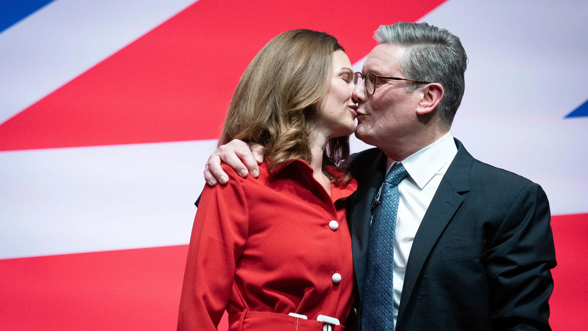 British Prime Minister Keir Starmer is joined on stage by his wife Victoria after delivering his keynote speech to the Labour Party Conference in Liverpool, England, Tuesday Sept. 24, 2024. (Stefan Rousseau/PA via AP)