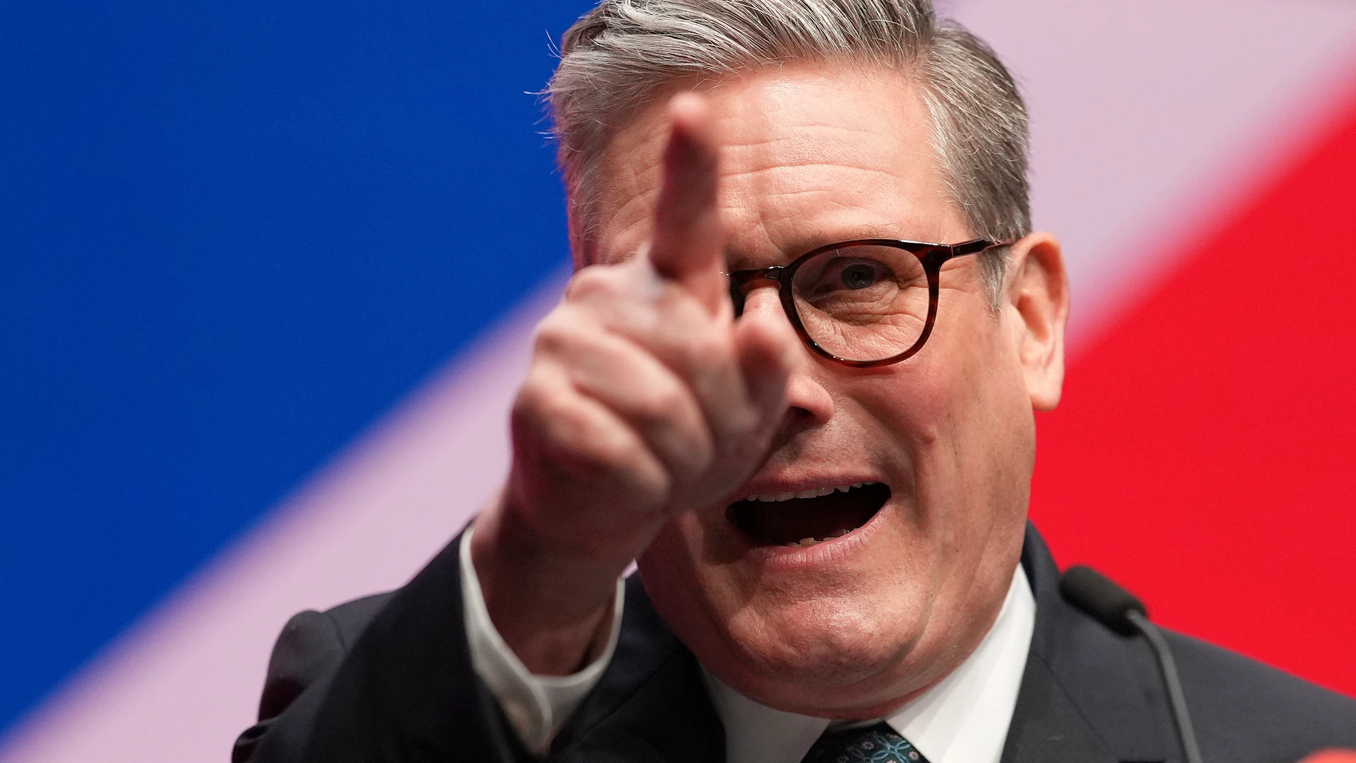 Britain's Prime Minister Keir Starmer addresses members at the Labour Party Conference in Liverpool, England, Tuesday, Sept. 24, 2024.(AP Photo/Jon Super)