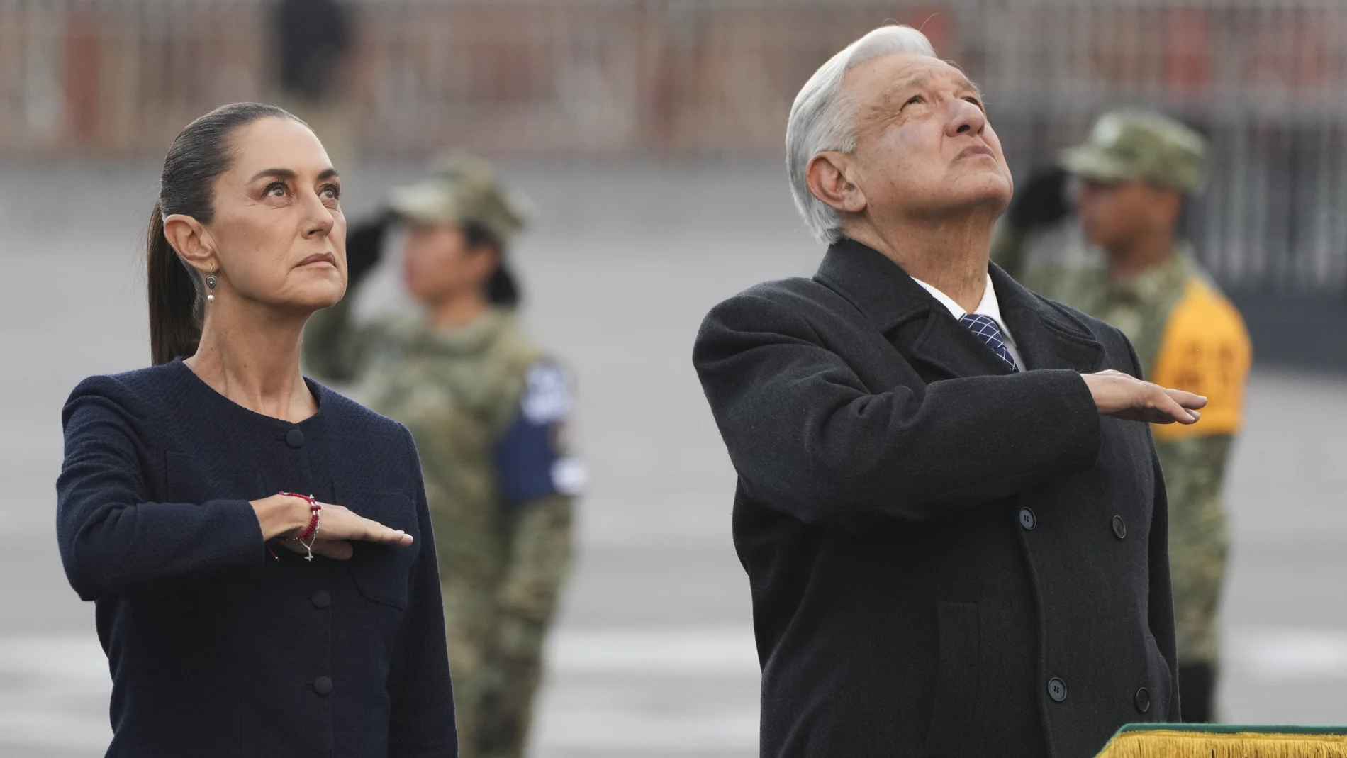 Mexico's President-elect Claudia Sheinbaum and outgoing President Andres Manuel Lopez Obrador attend an anniversary event honoring the victims of the 1985 and 2017 earthquakes, at the Zocalo in Mexico City