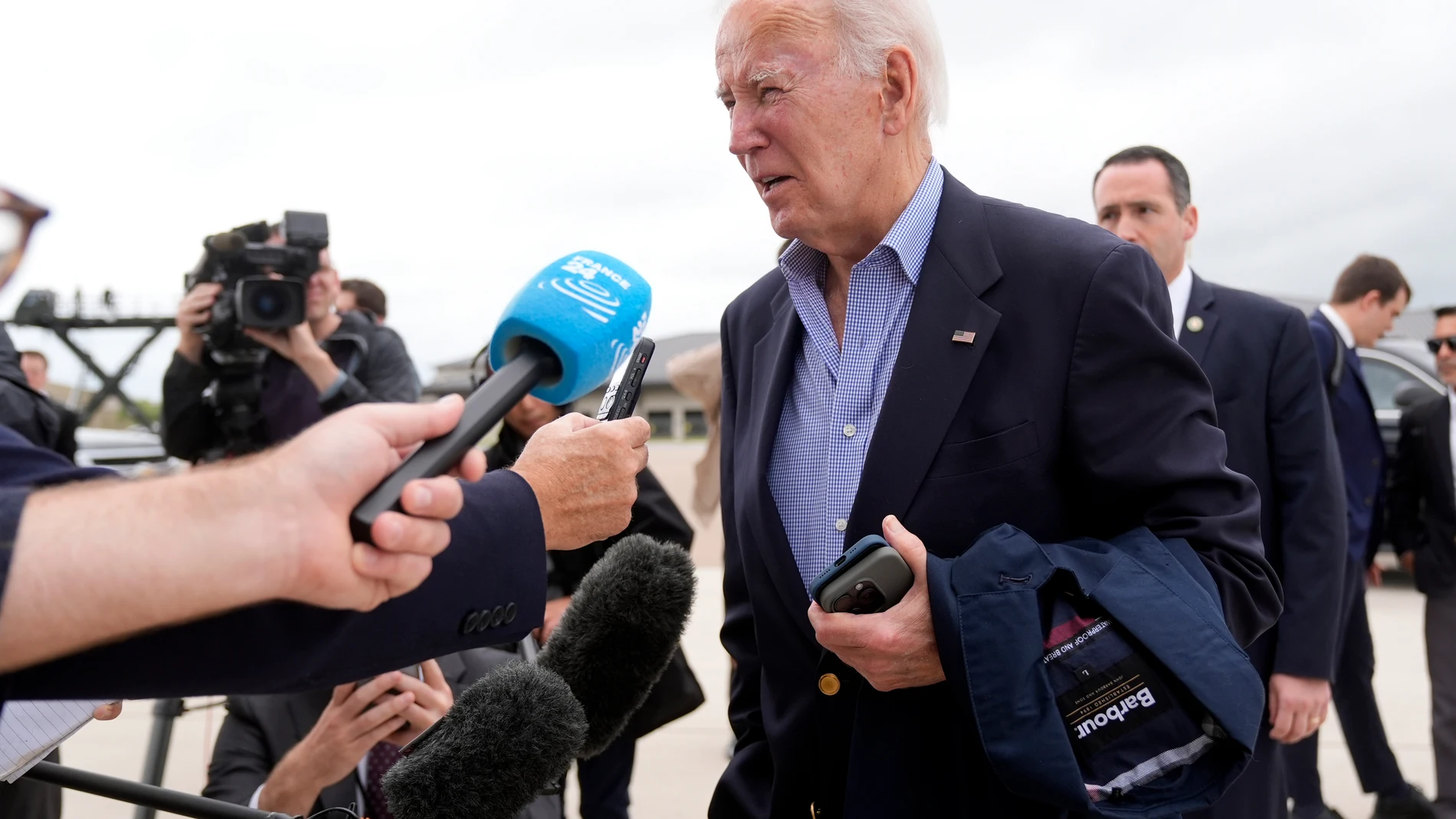 President Joe Biden speaks to reporters before boarding Air Force One at Dover Air Force Base, in Dover, Del., Sunday, Sept. 29, 2024, to return to Washington. (AP Photo/Manuel Balce Ceneta)
