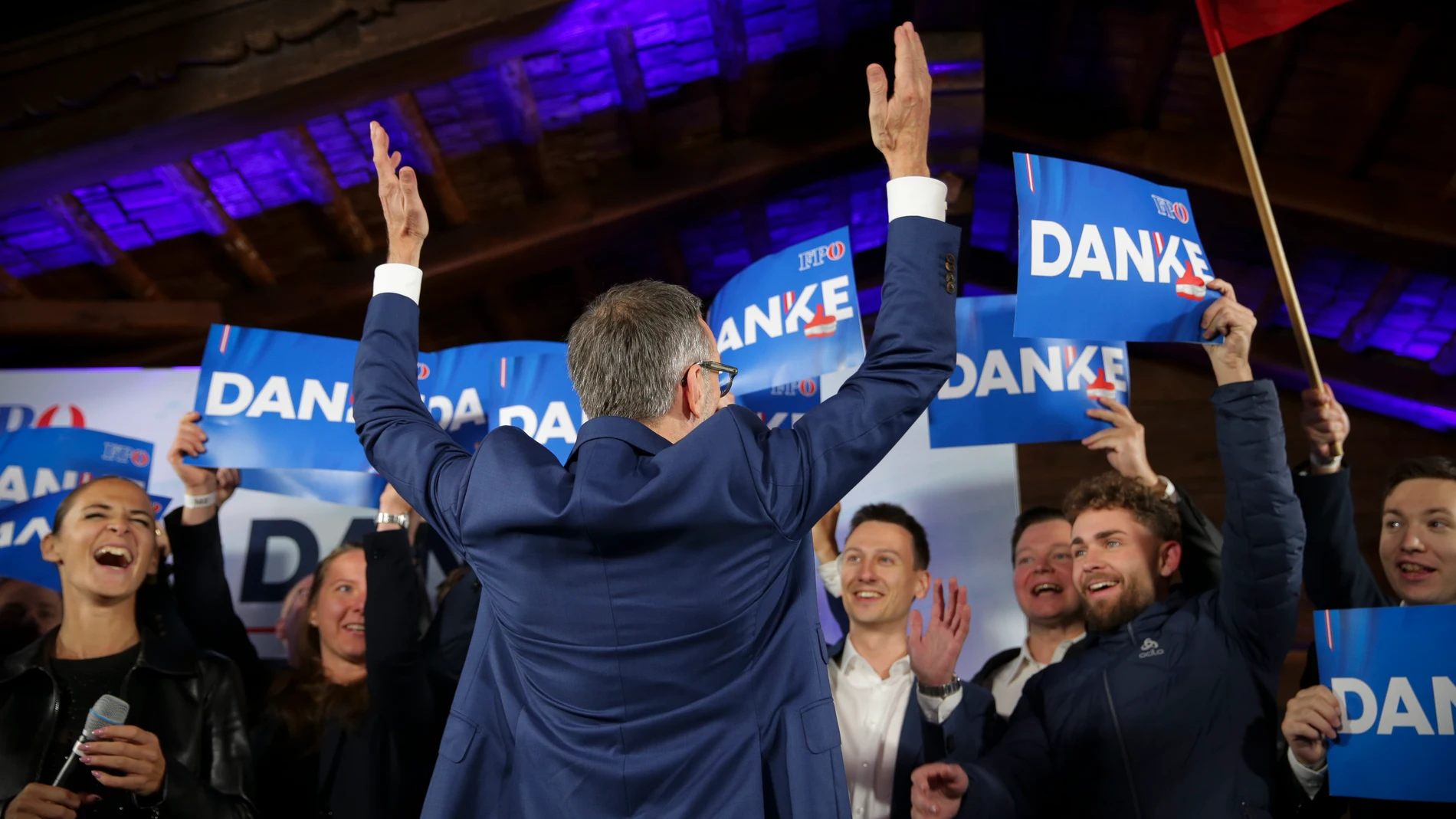 Herbert Kickl, leader of the Freedom Party of Austria cheers with supporters, in Vienna, Austria, Sunday, Sept. 29, 2024, after polls closed in the country's national election. (AP Photo/Heinz-Peter Bader)