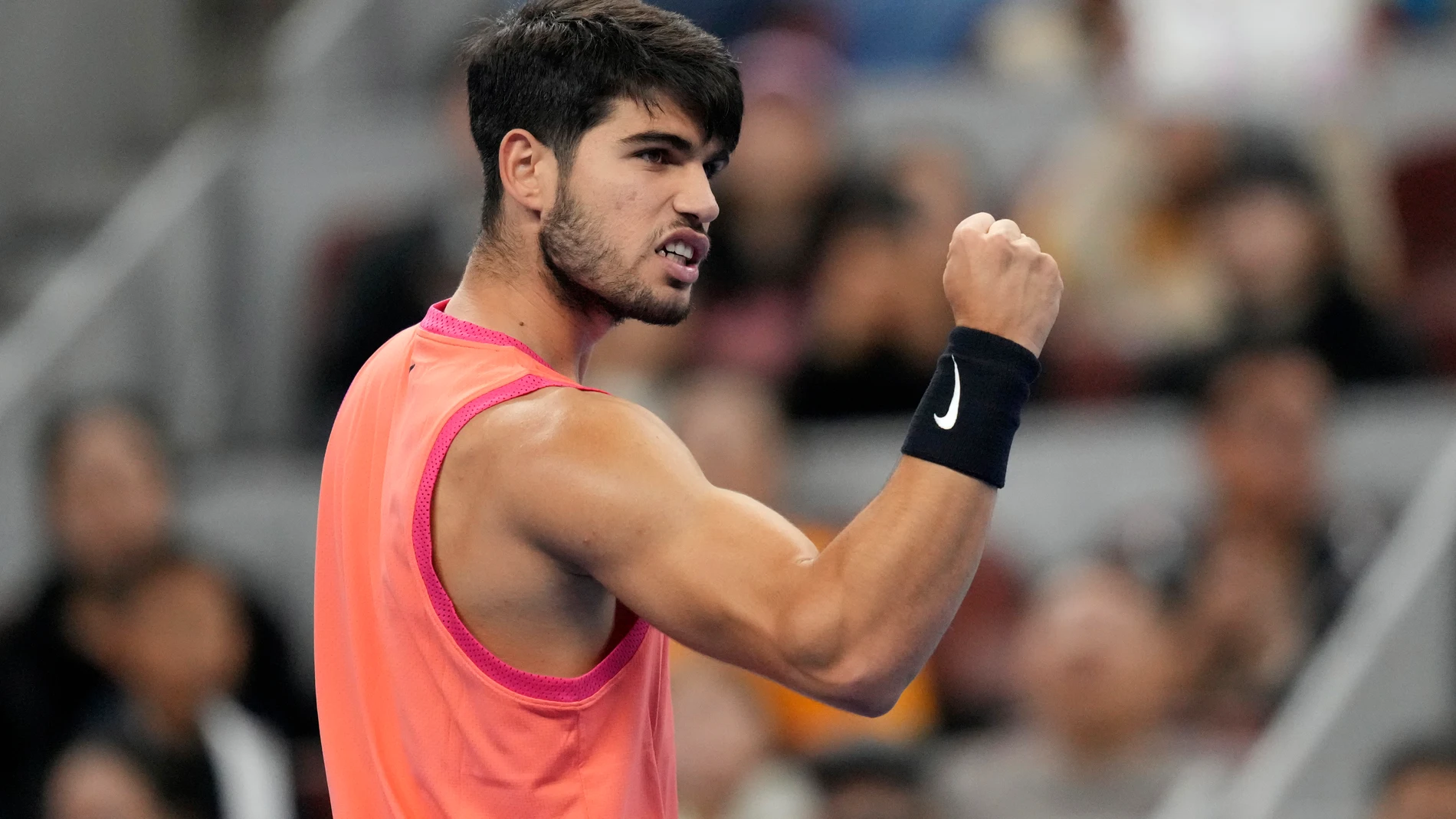 Carlos Alcaraz of Spain celebrates after winning a point against Daniil Medvedev of Russia during their men's singles semi-final match for the China Open tennis tournament held at the National Tennis Center in Beijing, Tuesday, Oct. 1, 2024.(AP Photo/Achmad Ibrahim)