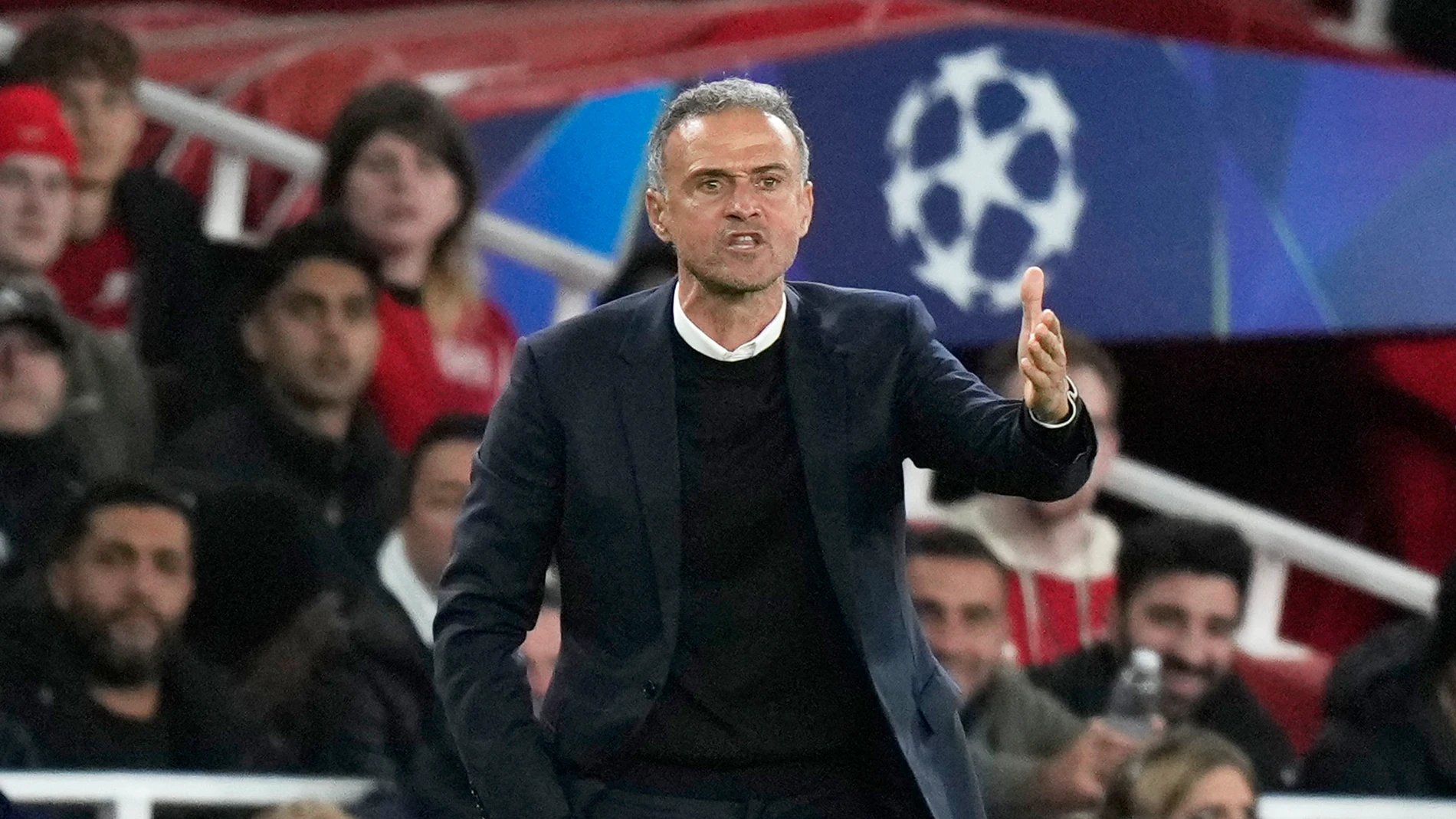 PSG's head coach Luis Enrique gestures during a Champions League opening phase soccer match between Arsenal FC and Paris Saint-Germain at Arsenal stadium in London, England, Tuesday, Oct. 1, 2024. (AP Photo/Alastair Grant)