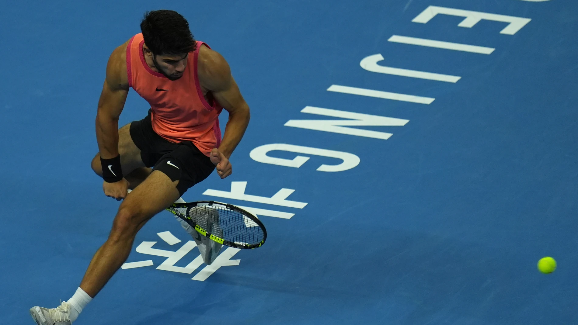 Carlos Alcaraz of Spain returns a shot from Daniil Medvedev of Russia during their men's singles semi-final match for the China Open tennis tournament held at the National Tennis Center in Beijing, Tuesday, Oct. 1, 2024. (AP Photo/Ng Han Guan)