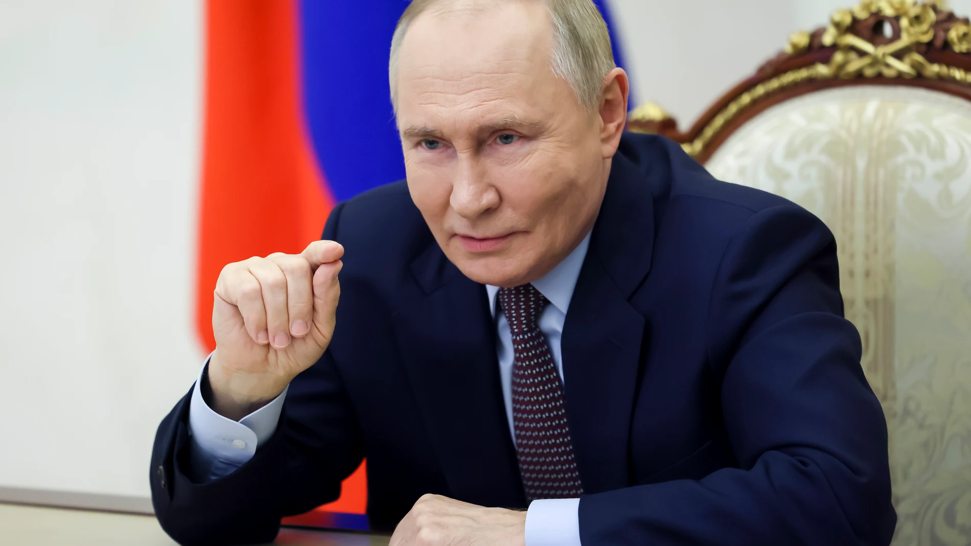 Russian President Vladimir Putin gesture during a meeting with winners of the Teacher of the Year in Russia competition the country's best teachers, school principals and mentors via videoconference at the Kremlin in Moscow, Russia, Thursday, Oct. 3, 2024. (Mikhail Metzel, Sputnik, Kremlin Pool Photo via AP)