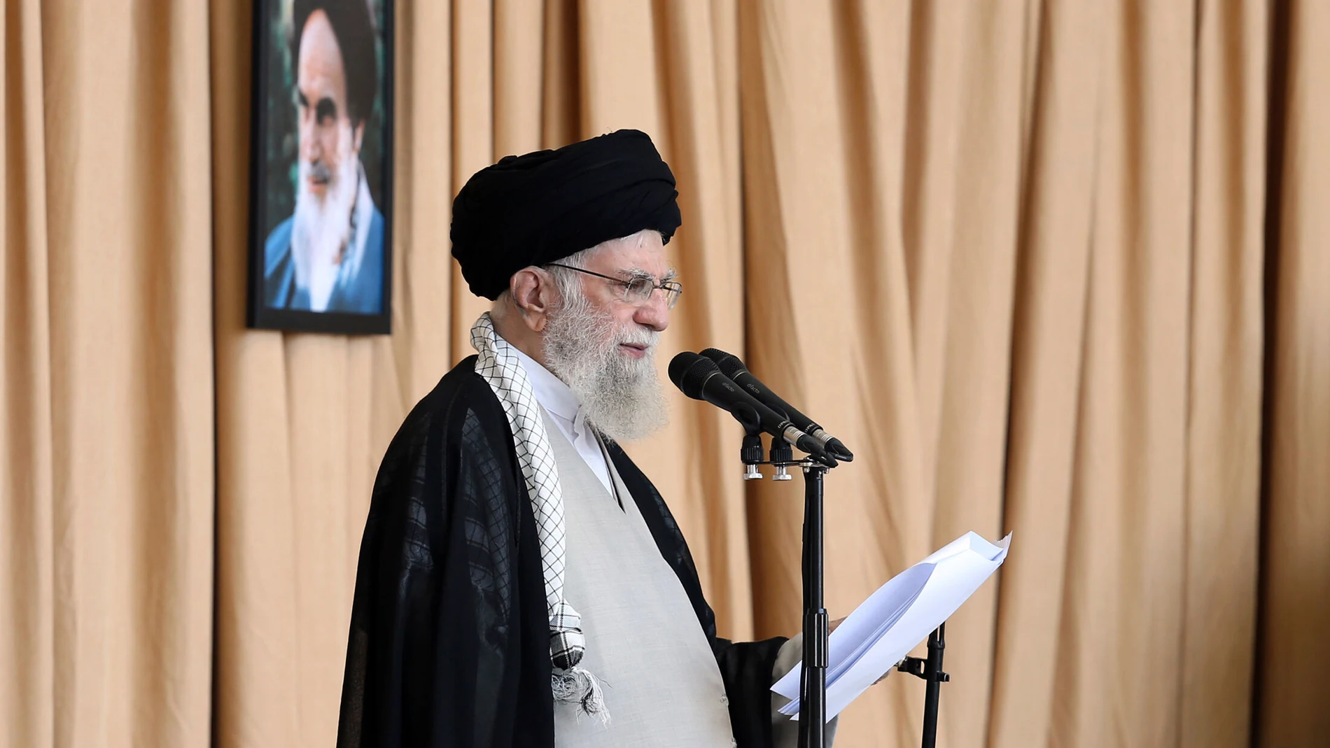 In this photo released by the official website of the office of the Iranian supreme leader, Supreme Leader Ayatollah Ali Khamenei delivers his sermon during Friday prayers at Imam Khomeini grand mosque, in Tehran, Iran, Friday, Oct. 4, 2024. (Office of the Iranian Supreme Leader via AP)