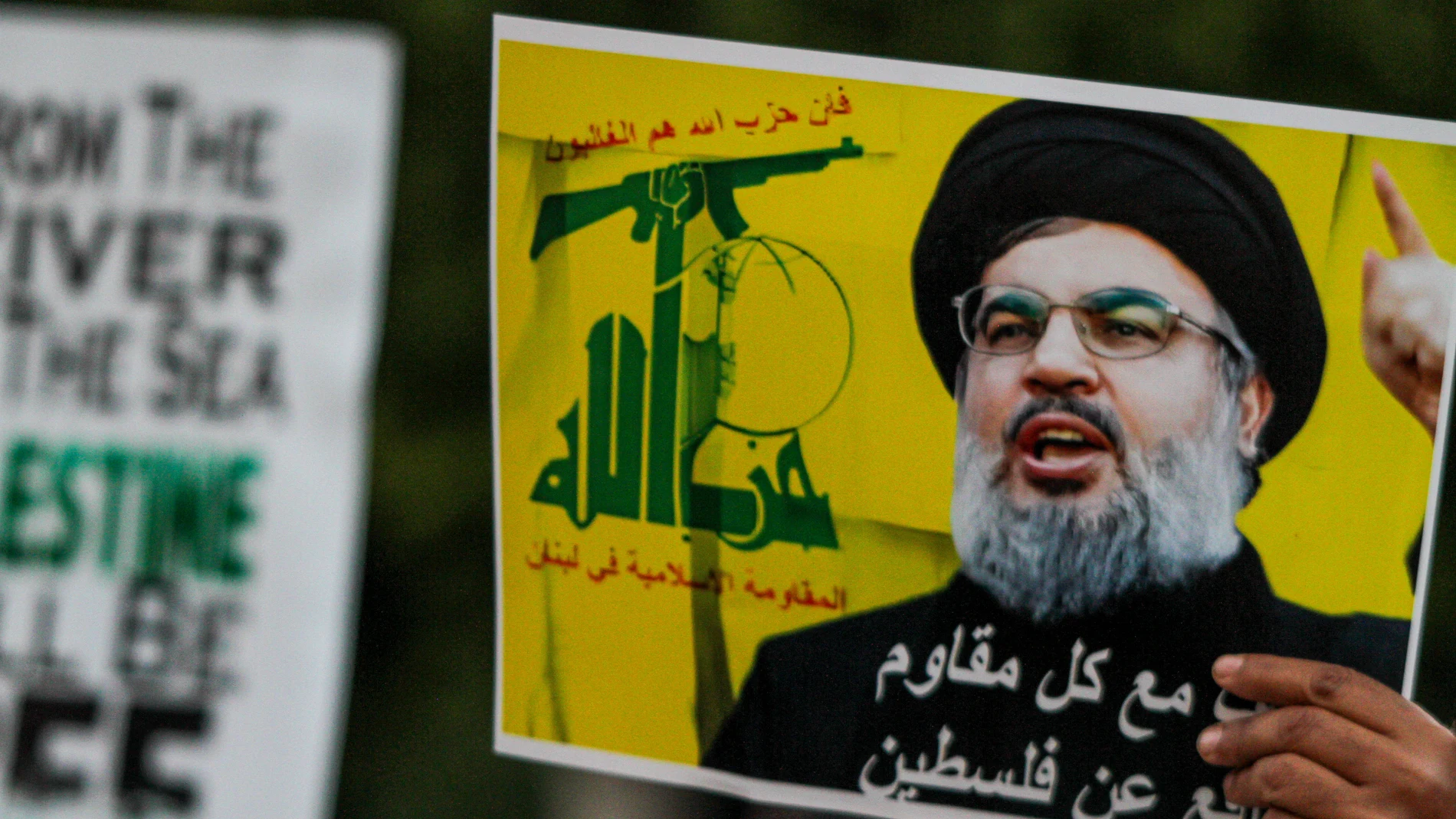October 2, 2024, Tunis, Tunisia: Tunis, Tunisia. 02 October 2024. Several images of late Hezbollah Secretary General Hassan Nasrallah are raised during a protest outside the Municipal theatre in Tunis in support of Palestinians and the Lebanese people amid Israel's military offensives in Gaza and Lebanon. Protesters also raised images of late Hezbollah commander, Fuad Shukur, and of late Hamas' leader Ismael Haniyeh to commemorate them following their assassination by Israel. Participants wav...