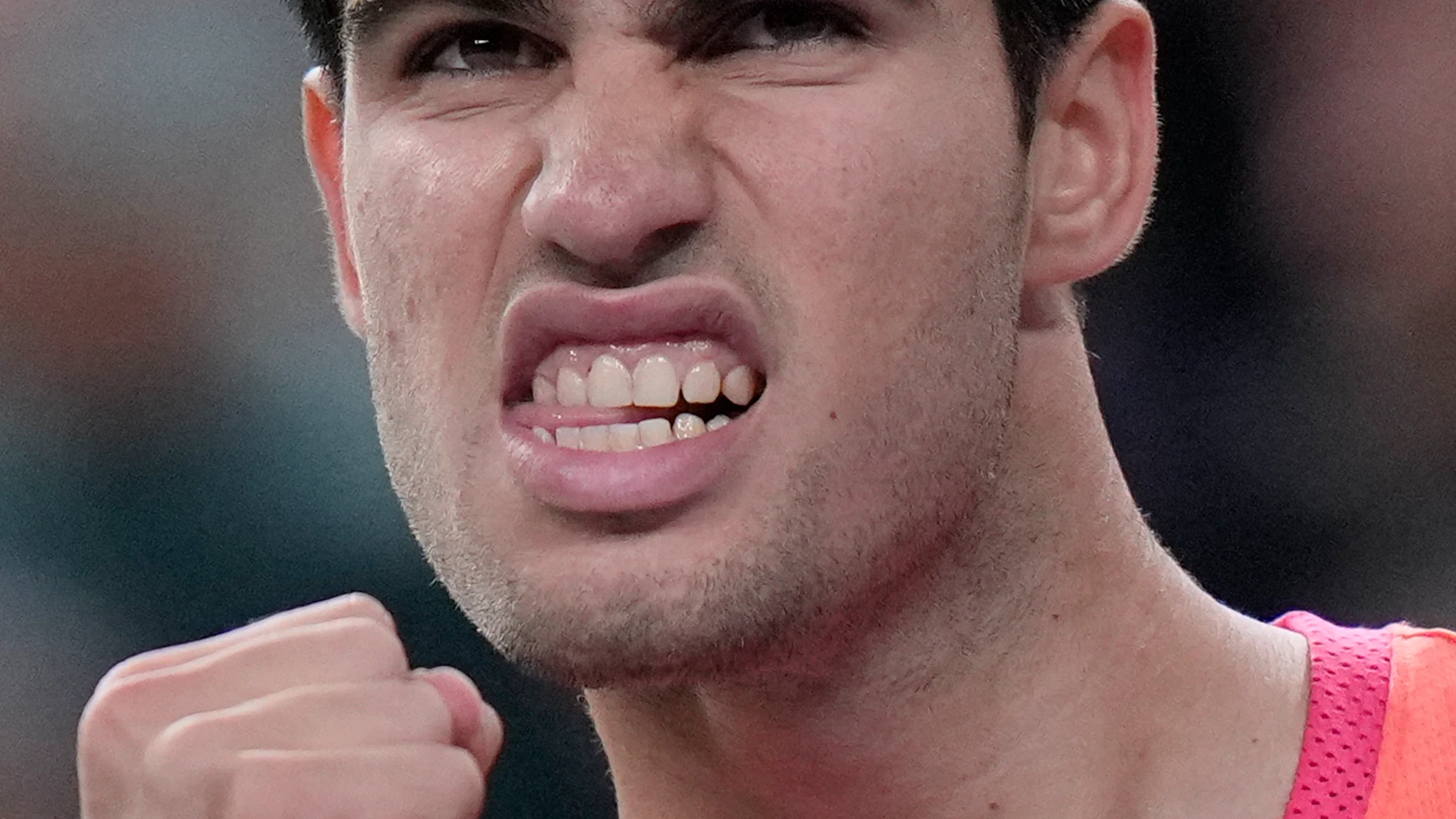 Carlos Alcaraz of Spain celebrates after defeating Wu Yibing of China in the men's singles third round match of the Shanghai Masters tennis tournament at Qizhong Forest Sports City Tennis Center in Shanghai, China, Sunday, Oct. 6, 2024. (AP Photo/Andy Wong)