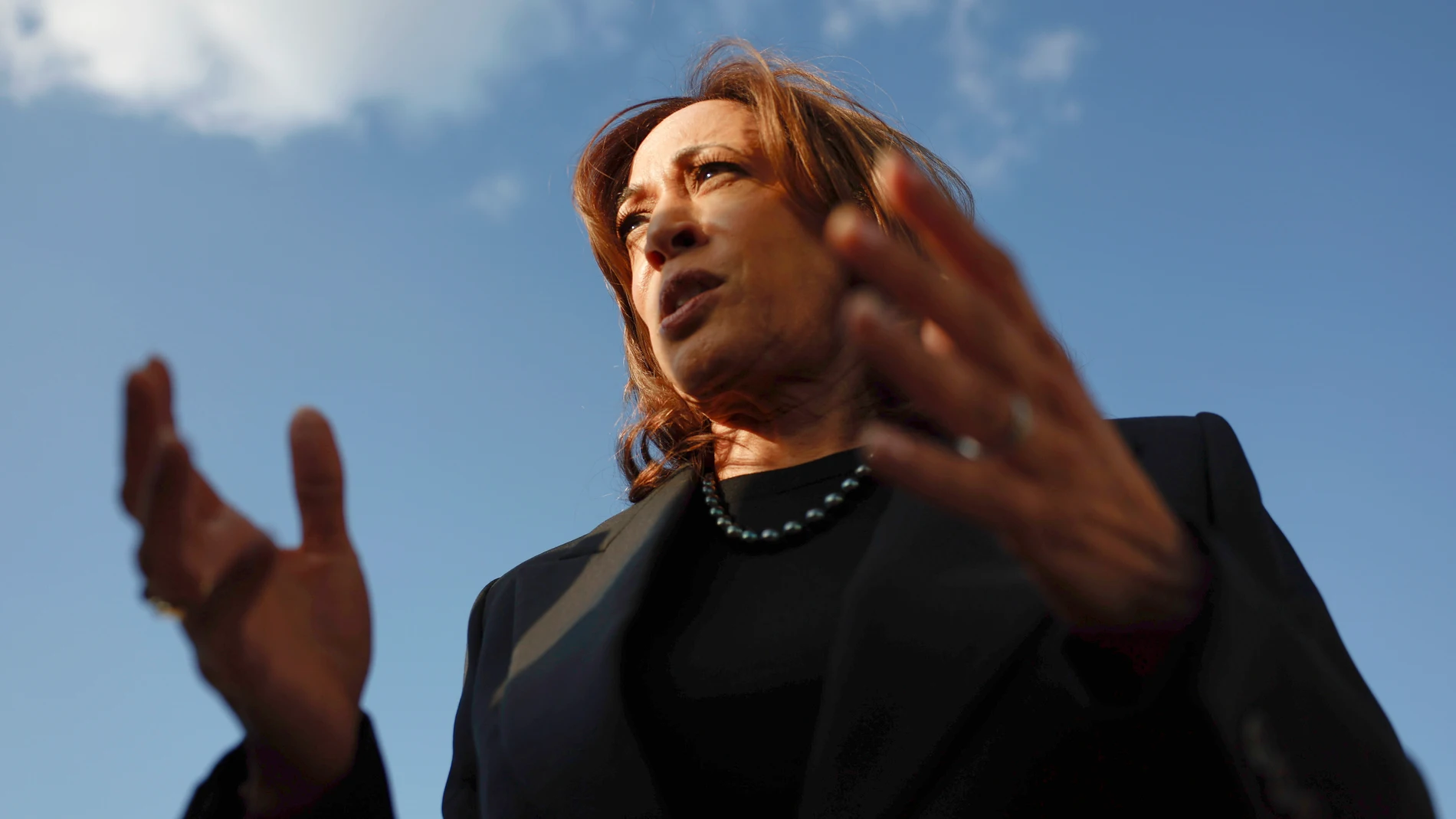 Democratic presidential nominee Vice President Kamala Harris speaks to reporters before boarding Air Force Two to depart for New York at Joint Base Andrews, Md., Monday, Oct. 7, 2024. (Evelyn Hockstein/Pool via AP)