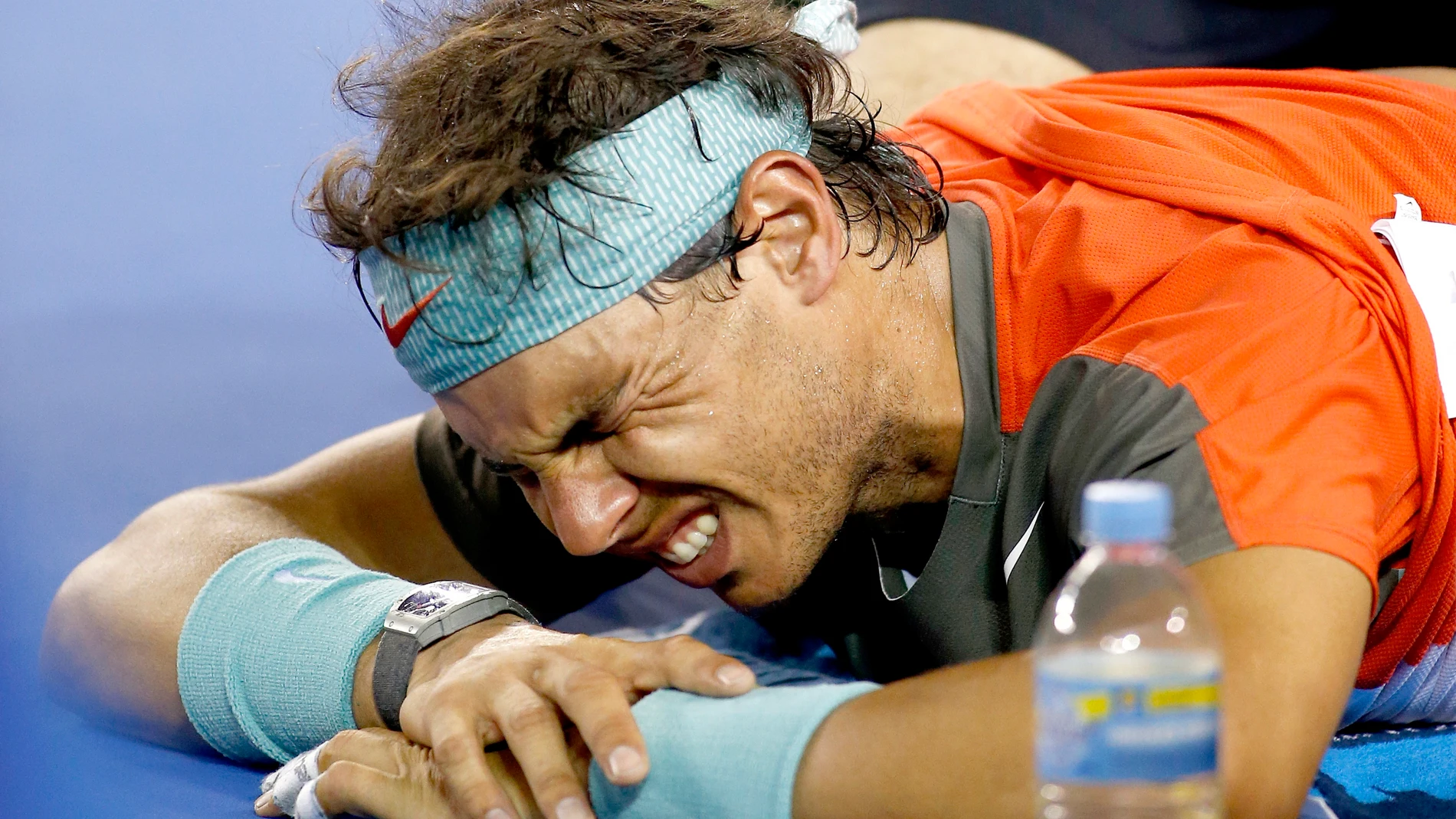 Melbourne (Australia), 26/01/2014.- (FILE) - Rafael Nadal of Spain grimaces as he receives medical treatment during his men's final match against Stanislas Wawrinka of Switzerland at the Australian Open Grand Slam tennis tournament in Melbourne, Australia, 26 January 2014 (reissued 10 October 2024). On 10 October 2024, Rafael Nadal of Spain announced that he will retire from professional tennis. Since winning his first ever title in 2004, Nadal won 92 titles, including 22 grand slams and a re...