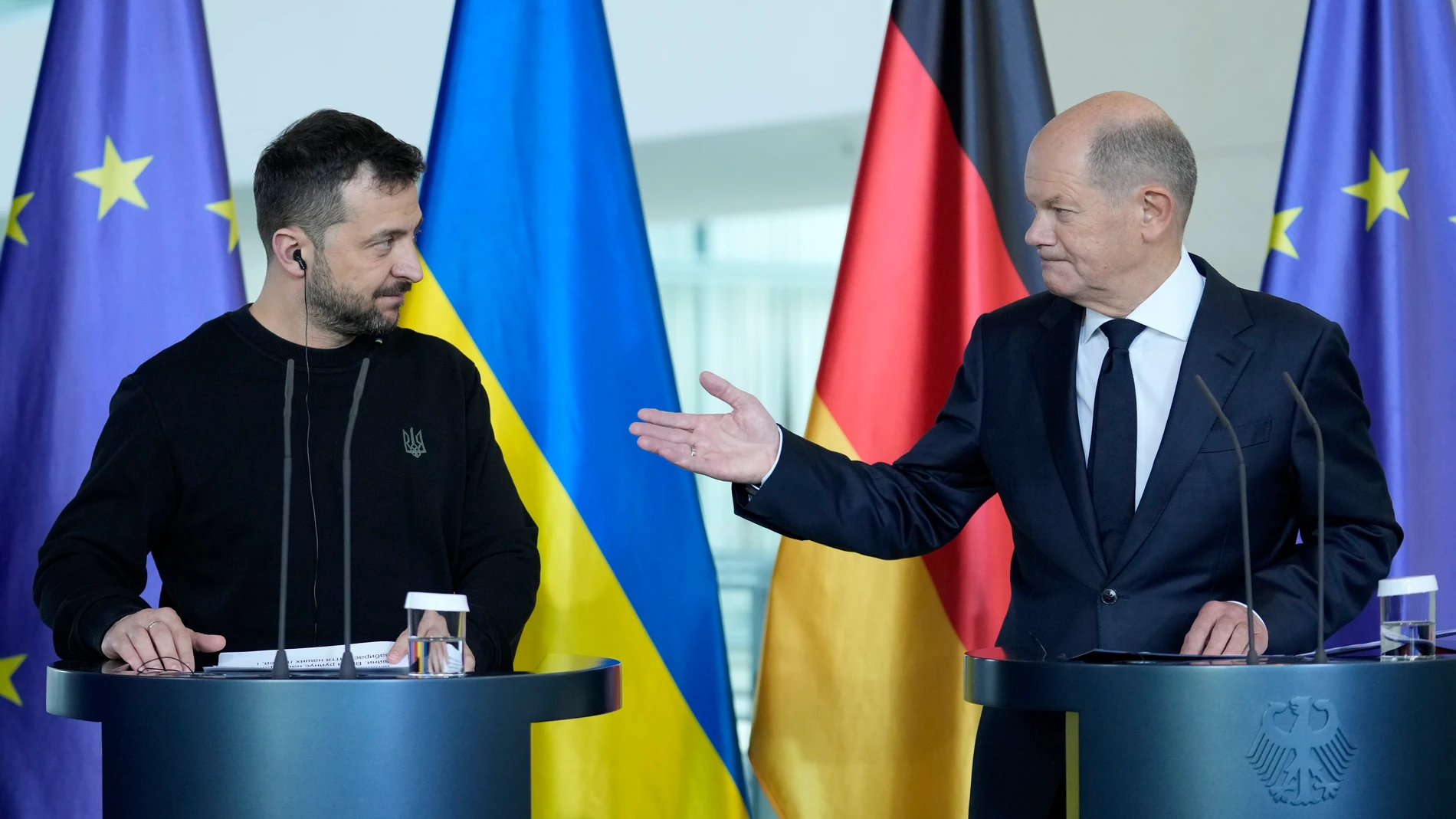 Ukraine's president Volodymyr Zelenskyy and German chancellor Olaf Scholz reacts during a statement at the chancellery in Berlin, Germany, Friday, Oct. 11, 2024. (AP Photo/Ebrahim Noroozi)