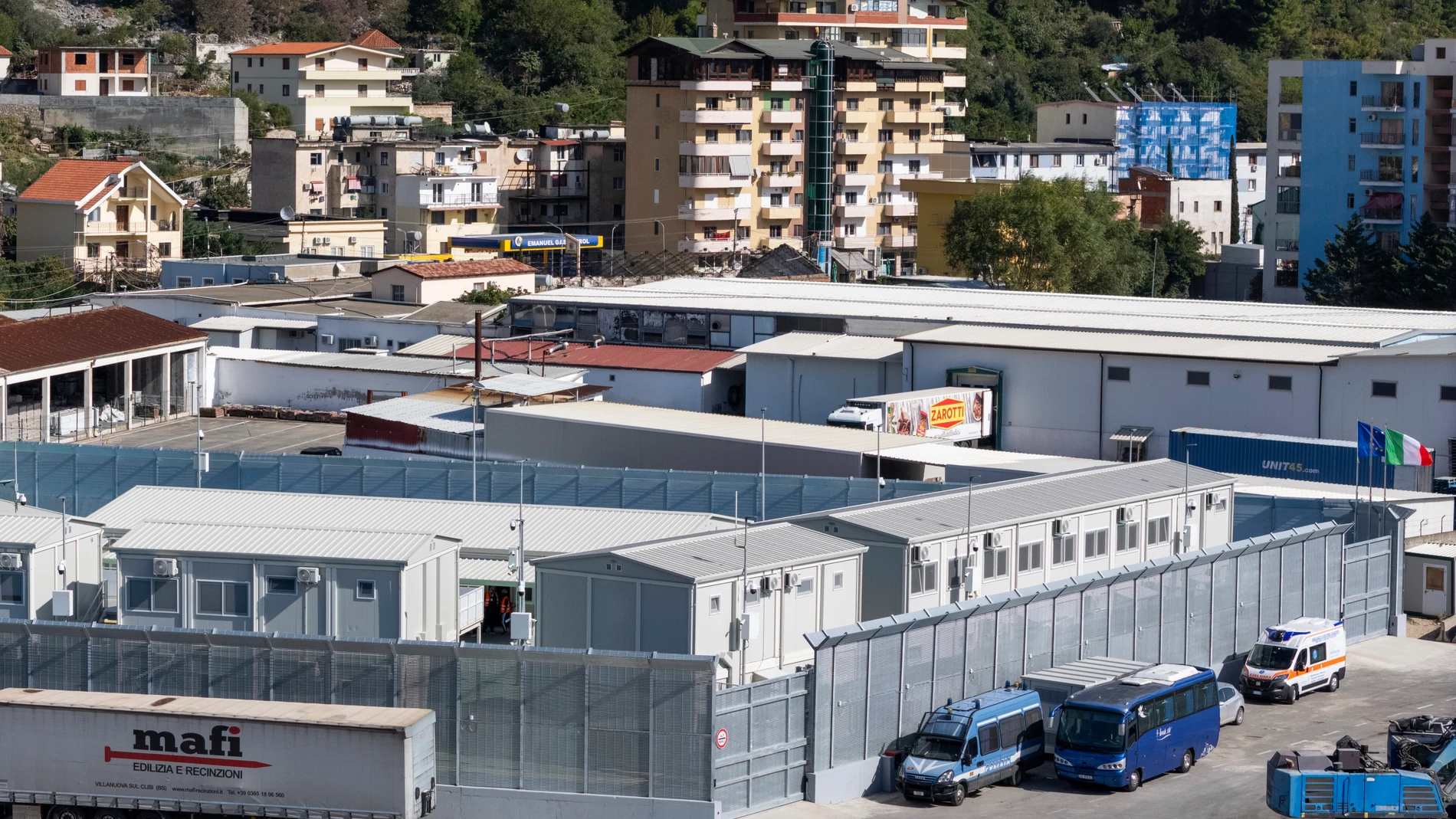 A view of a migrant processing center at the port of Shengjin, northwestern Albania Wednesday, Oct. 16, 2024, as the first group of migrants who were intercepted in international waters arrived Wednesday. (AP Photo/Vlasov Sulaj)