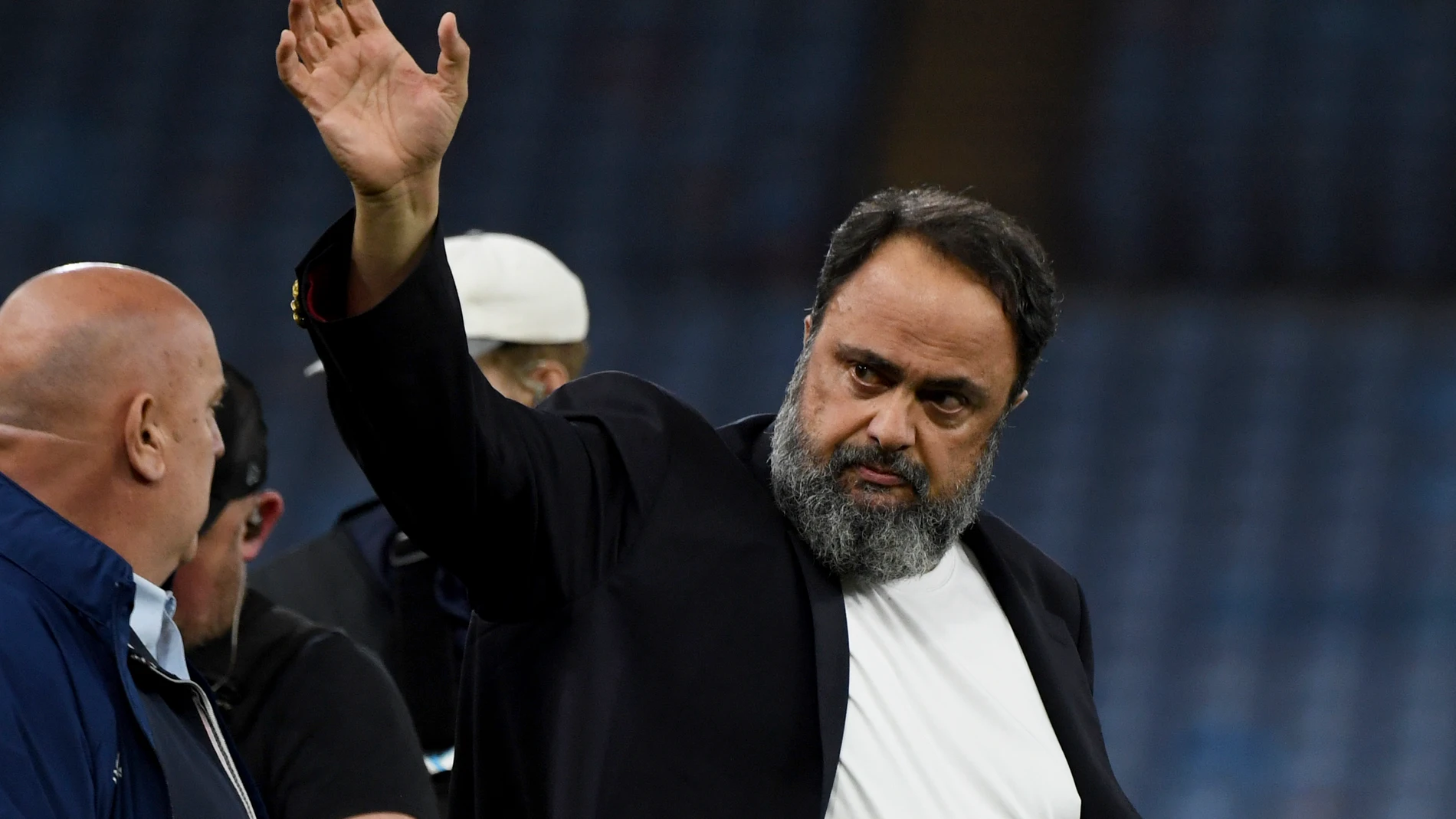FILE - Evangelos Marinakis walks on the pitch at the end of the Europa Conference League semifinal, first leg, soccer match between Aston Villa and Olympiacos at Villa Park in Birmingham, England, Thursday, May 2, 2024. (AP Photo/Rui Vieira, File)