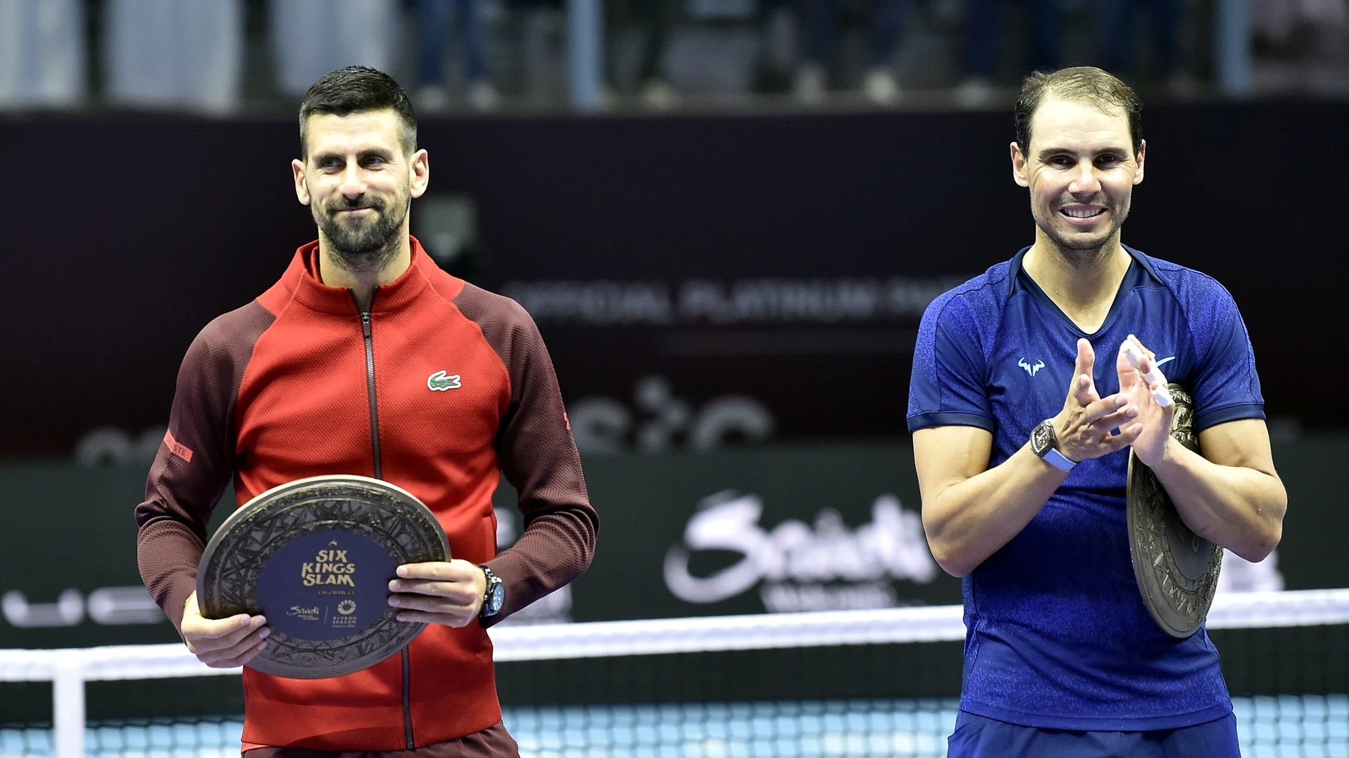 Riyadh (Saudi Arabia), 19/10/2024.- Novak Djokovic of Serbia (L) and Rafel Nadal of Spain hold their trophies after their third place match at the Six Kings Slam exhibition tennis tournament in Riyadh, Saudi Arabia, 19 October 2024. (Tenis, Arabia Saudita, España) EFE/EPA/STR