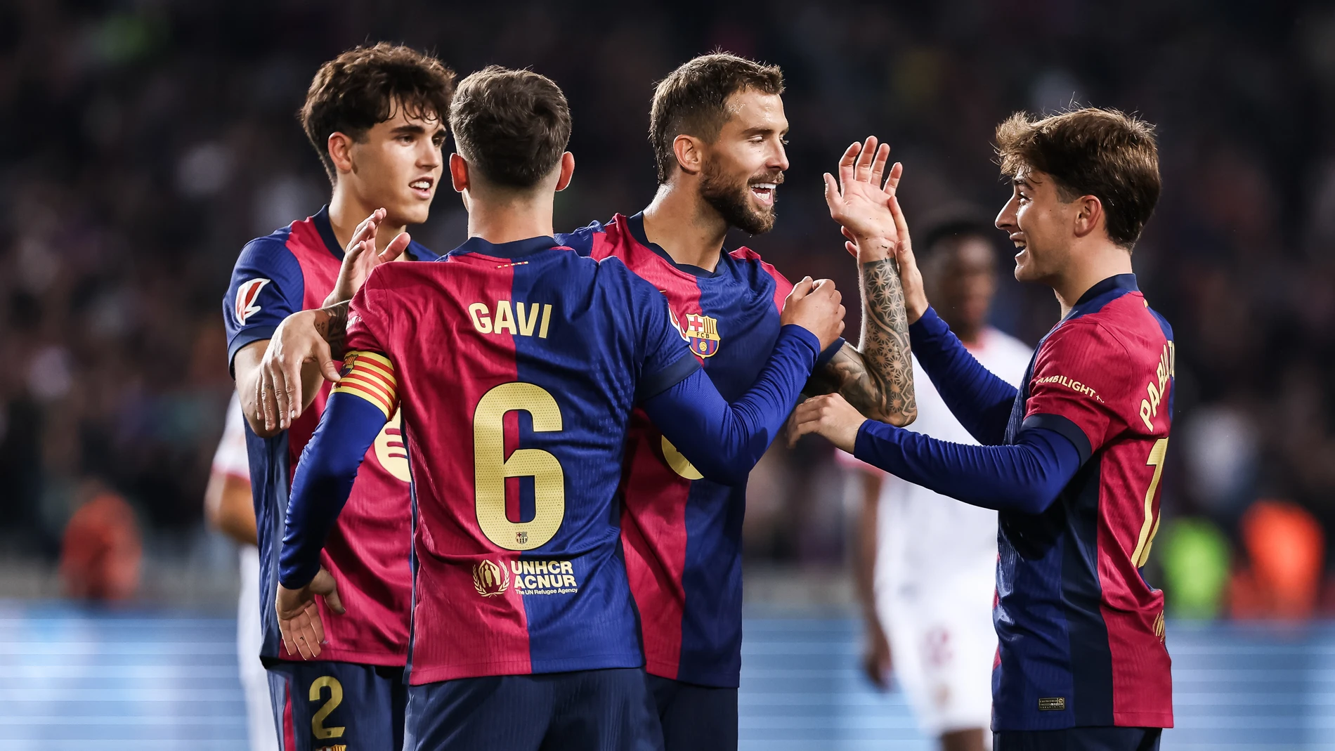 Pablo Torre of FC Barcelona celebrates a goal with his teammates during the Spanish league, La Liga EA Sports, football match played between FC Barcelona and Sevilla FC at Estadio Olimpico de Montjuic on October 20, 2024 in Barcelona, Spain. AFP7 20/10/2024 ONLY FOR USE IN SPAIN
